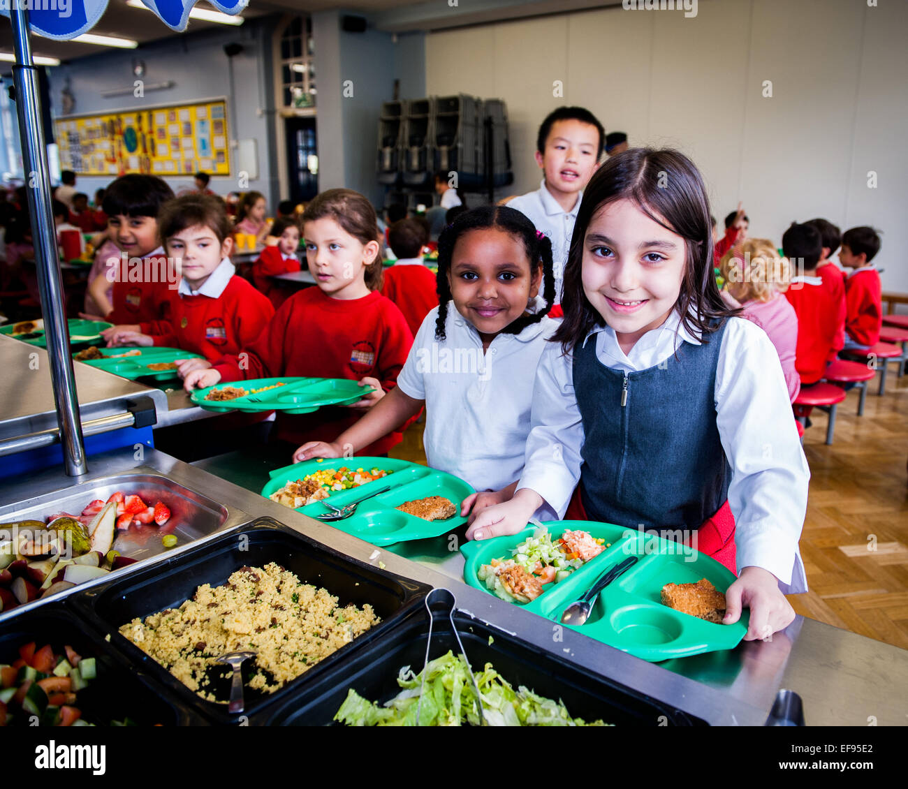 Lunchtime At UK State Primary School Primary School Children At Stock 