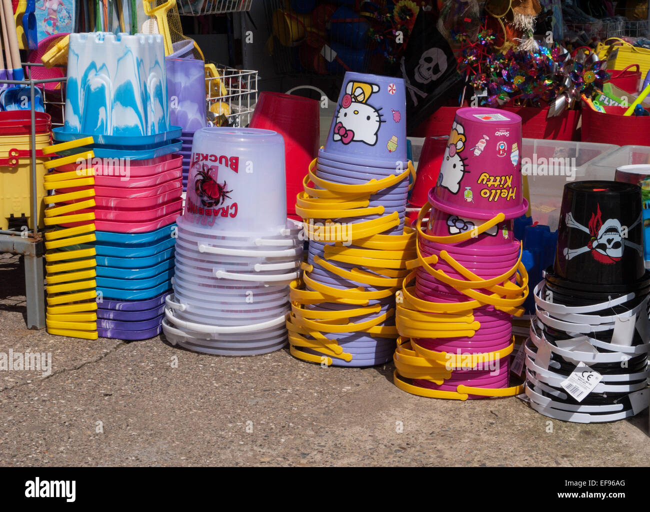 Seaside toy buckets in a shop near the beach in Filey, Yorkshire. Stock Photo