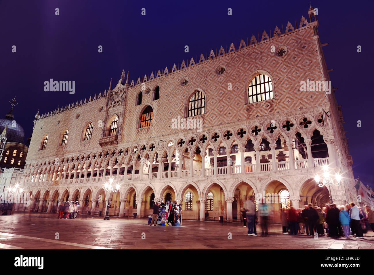 Doge's palace at evening with blurred tourists Stock Photo - Alamy