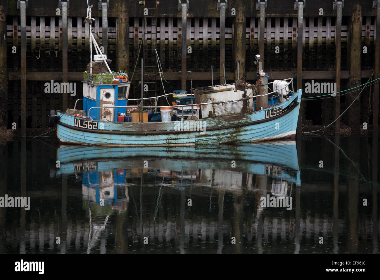 Fishing Boat in Ullapool Harbour on a grey day Stock Photo Alamy