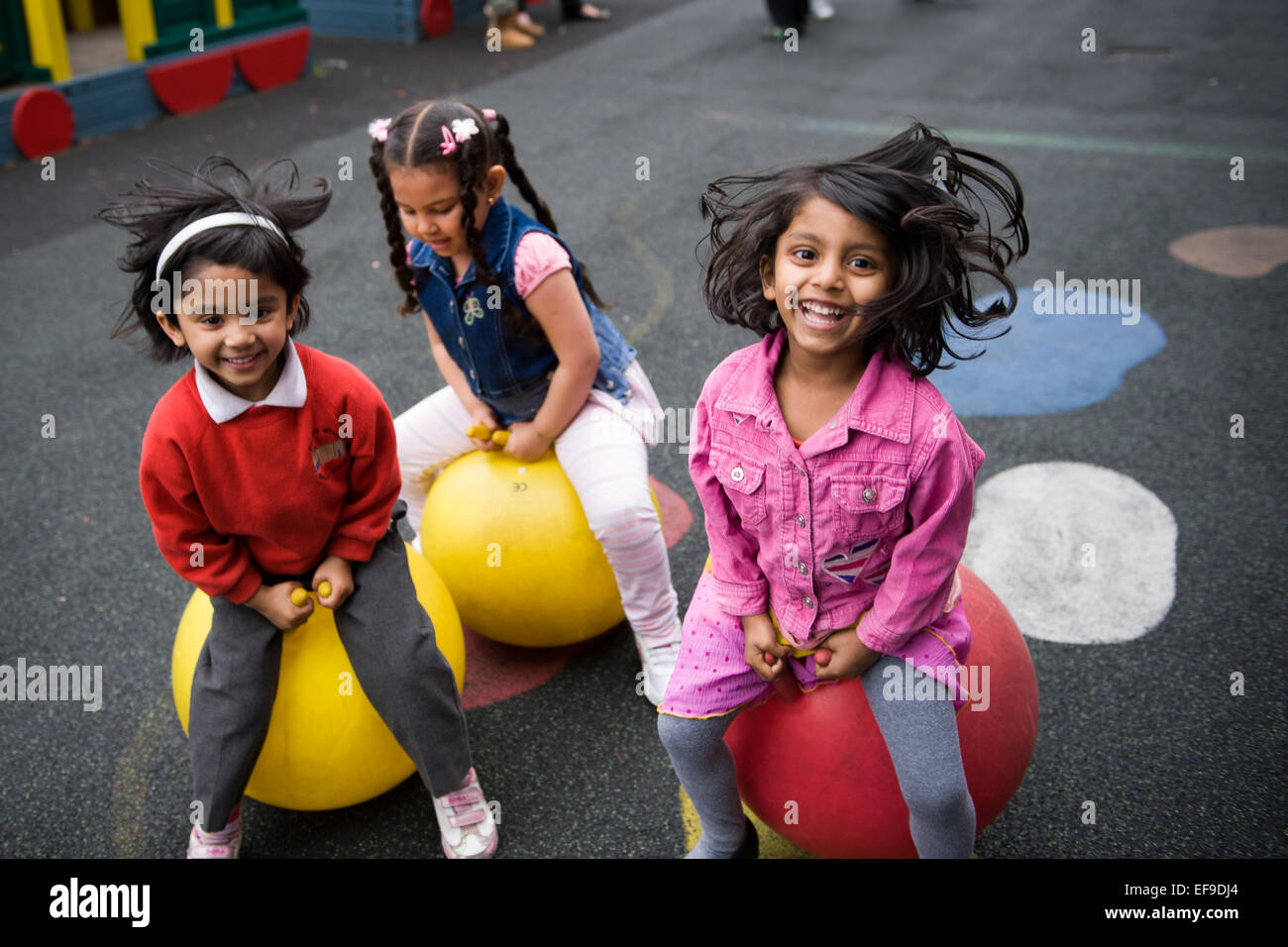 girls on space hoppers