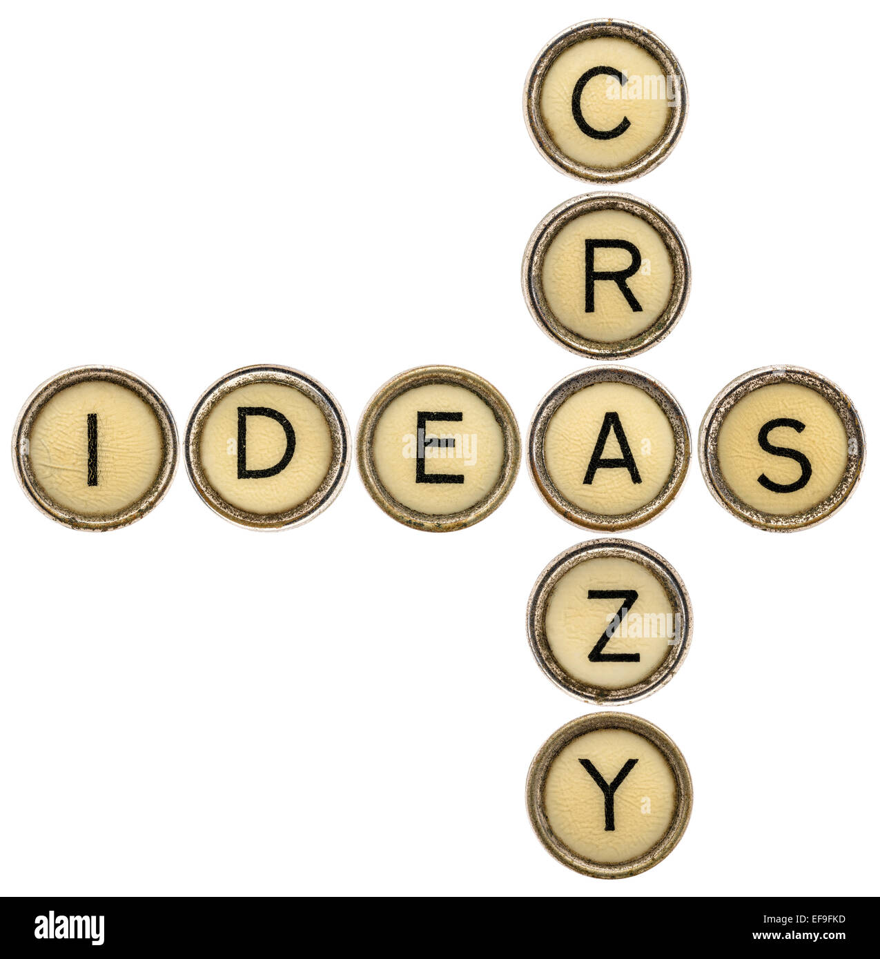 crazy ideas crossword in old round typewriter keys isolated on white