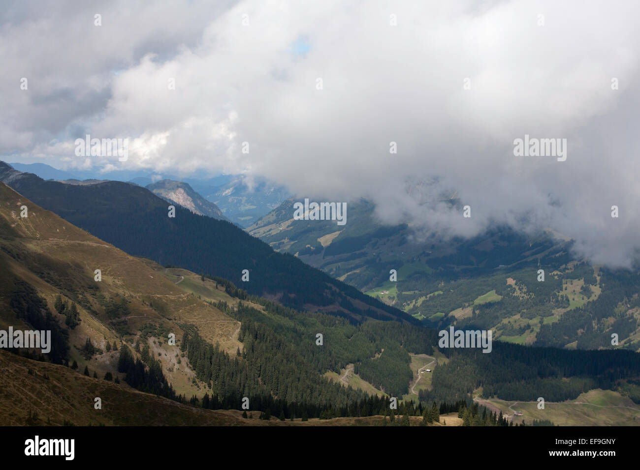 Cloud and snow The Maurerkogel and The Schmittenhohe above Zell am See Pinzgau Salzbergerland Austria Stock Photo