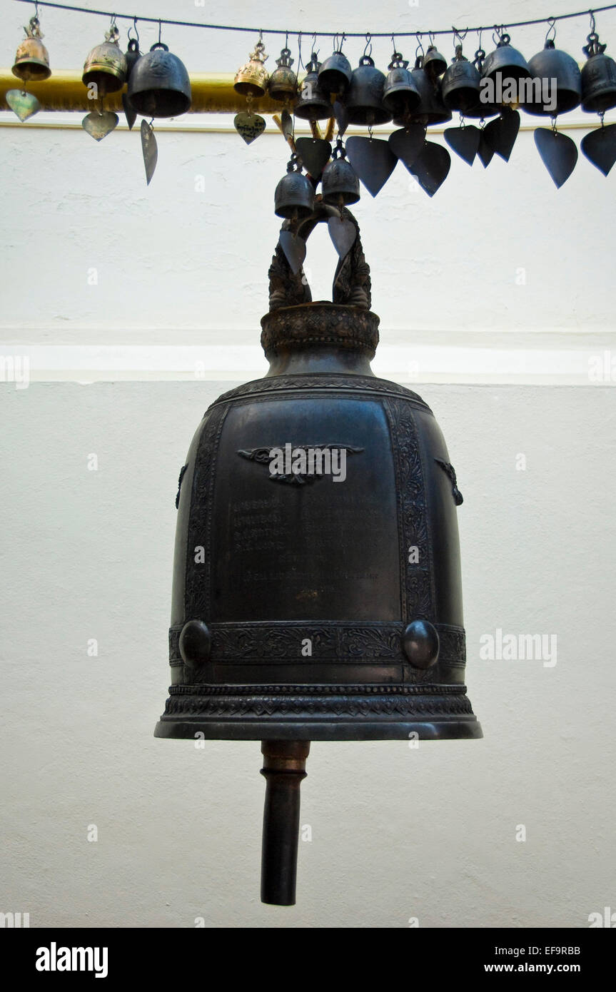 Vertical view of a Buddhist prayer bells hanging at Wat Doi Suthep in Chiang Mai. Stock Photo