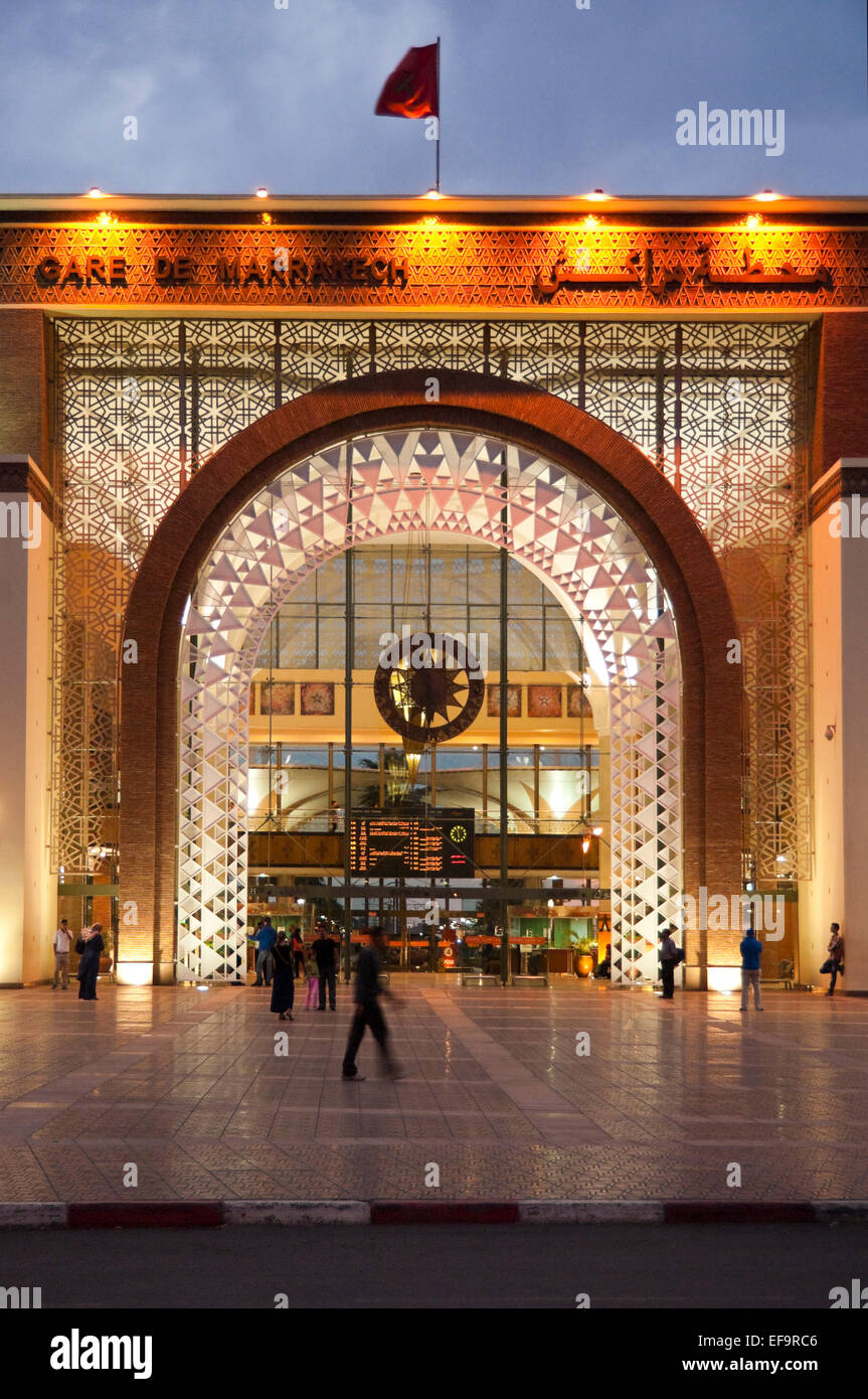 Vertical streetscape of the railway station in Marrakech at dusk (with motion blur). Stock Photo