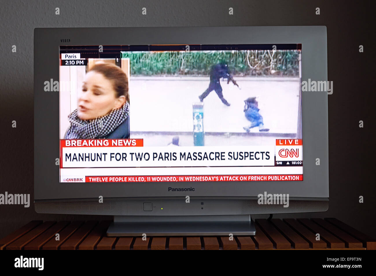 CNN live breaking news of the terror attack on Charlie Hebdo offices in Paris France (07/01/15) Stock Photo