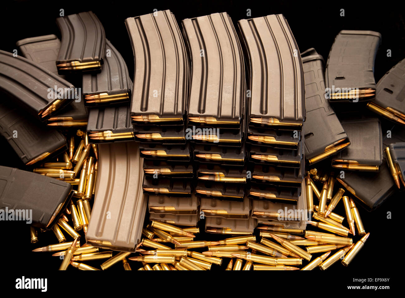 High capacity ammunition magazine clips filled with live 5.56mm .223 ammo Stock Photo