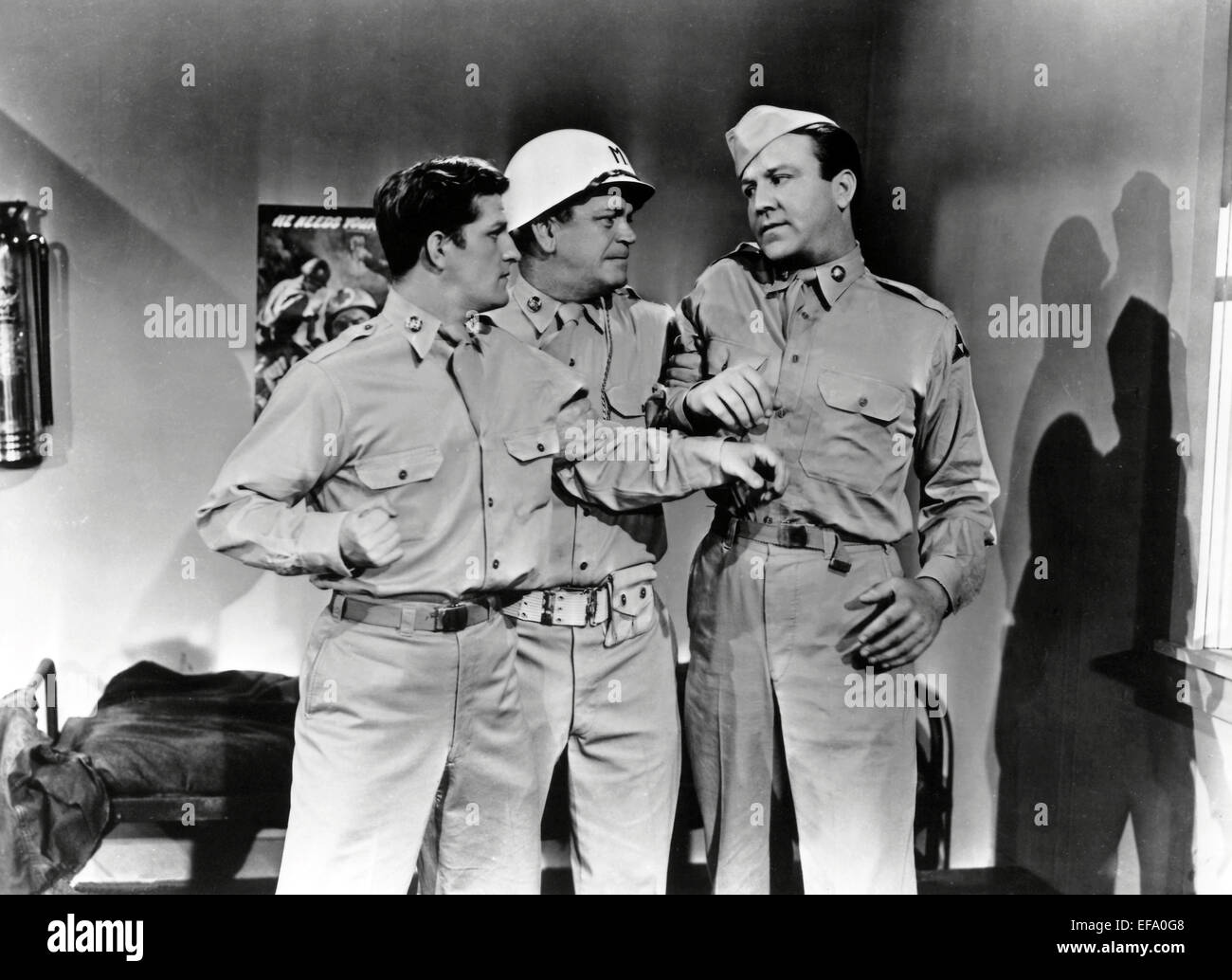 STANLEY CLEMENTS, MURRAY ALPER, STEVE BRODIE, ARMY BOUND, 1952 Stock Photo