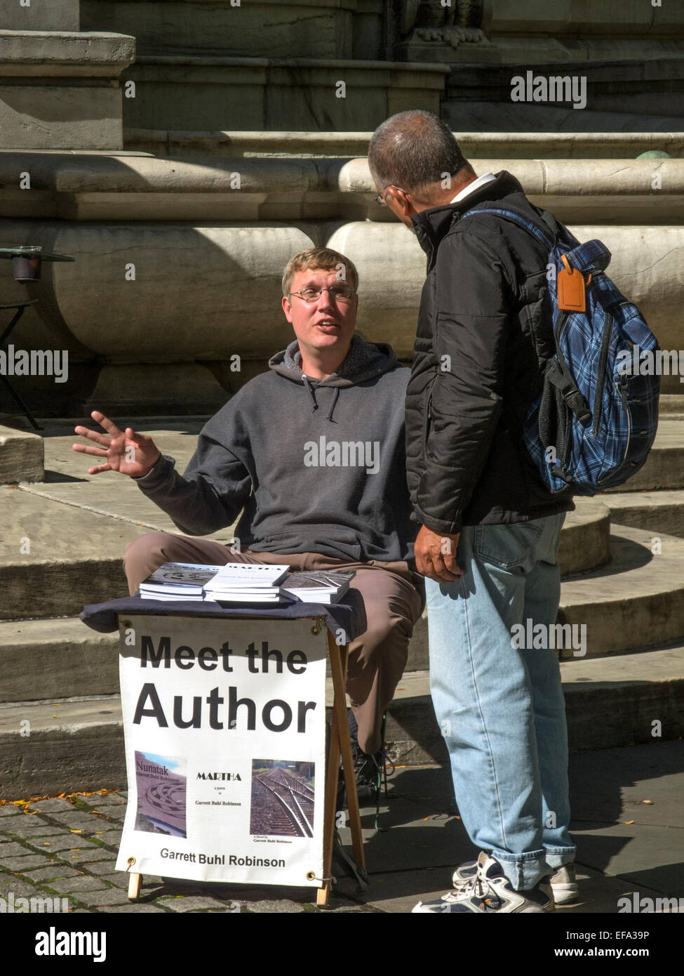 Sitting at table outside the New York Public Library on Fifth Avenue ...