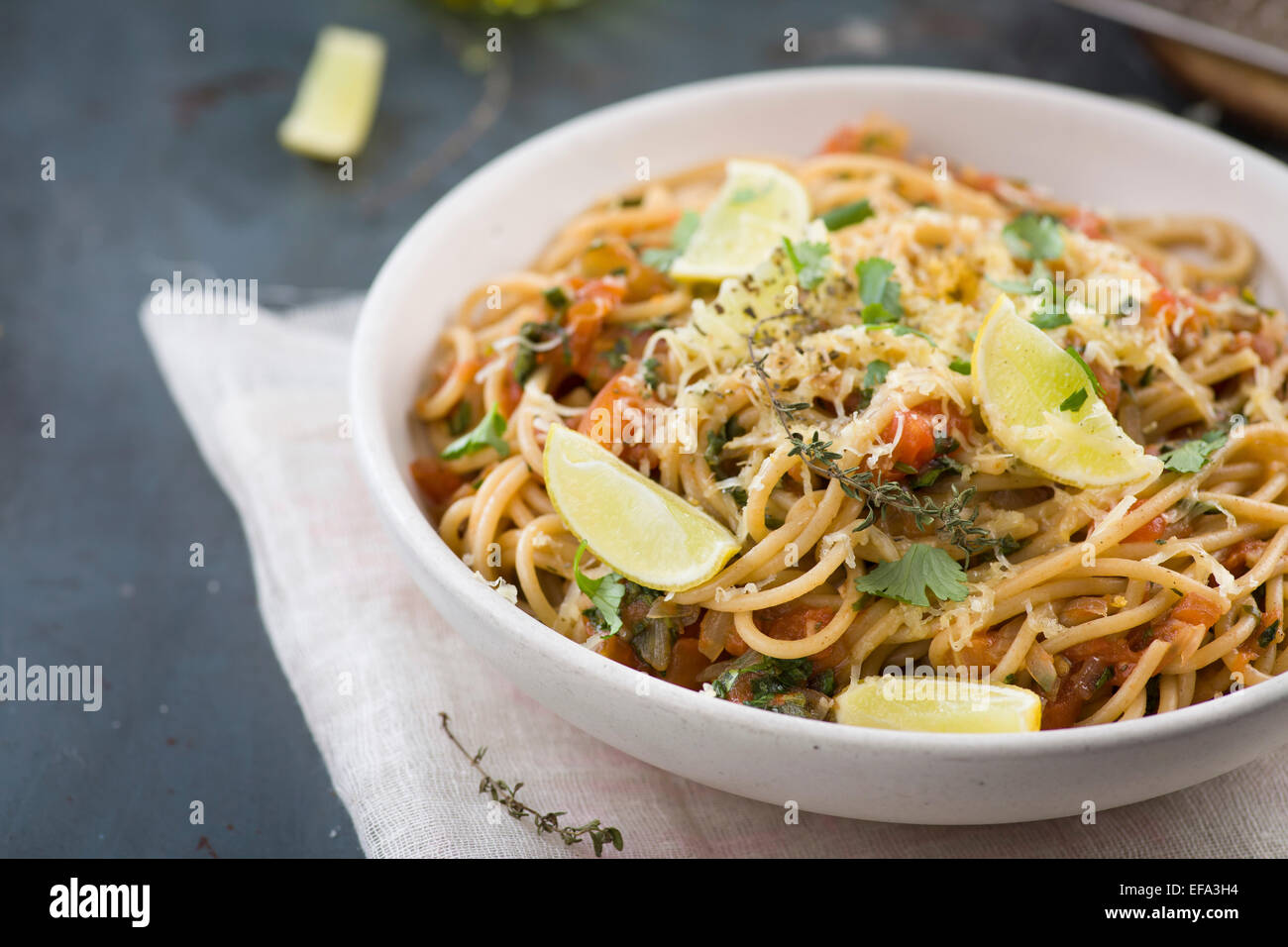 spaghetti with tomato sauce and herbs Stock Photo