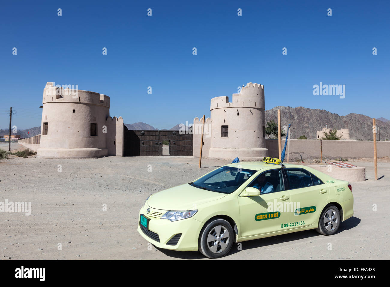 Local taxi at the historic fort in Fujairah, United Arab Emirates Stock Photo