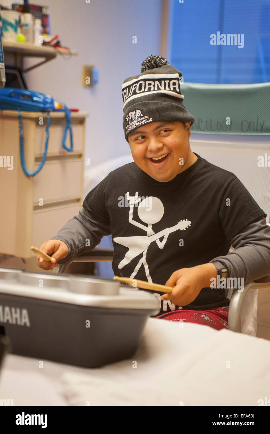 A young Hispanic patient at CHOC Children's Hospital, Orange, CA, plays