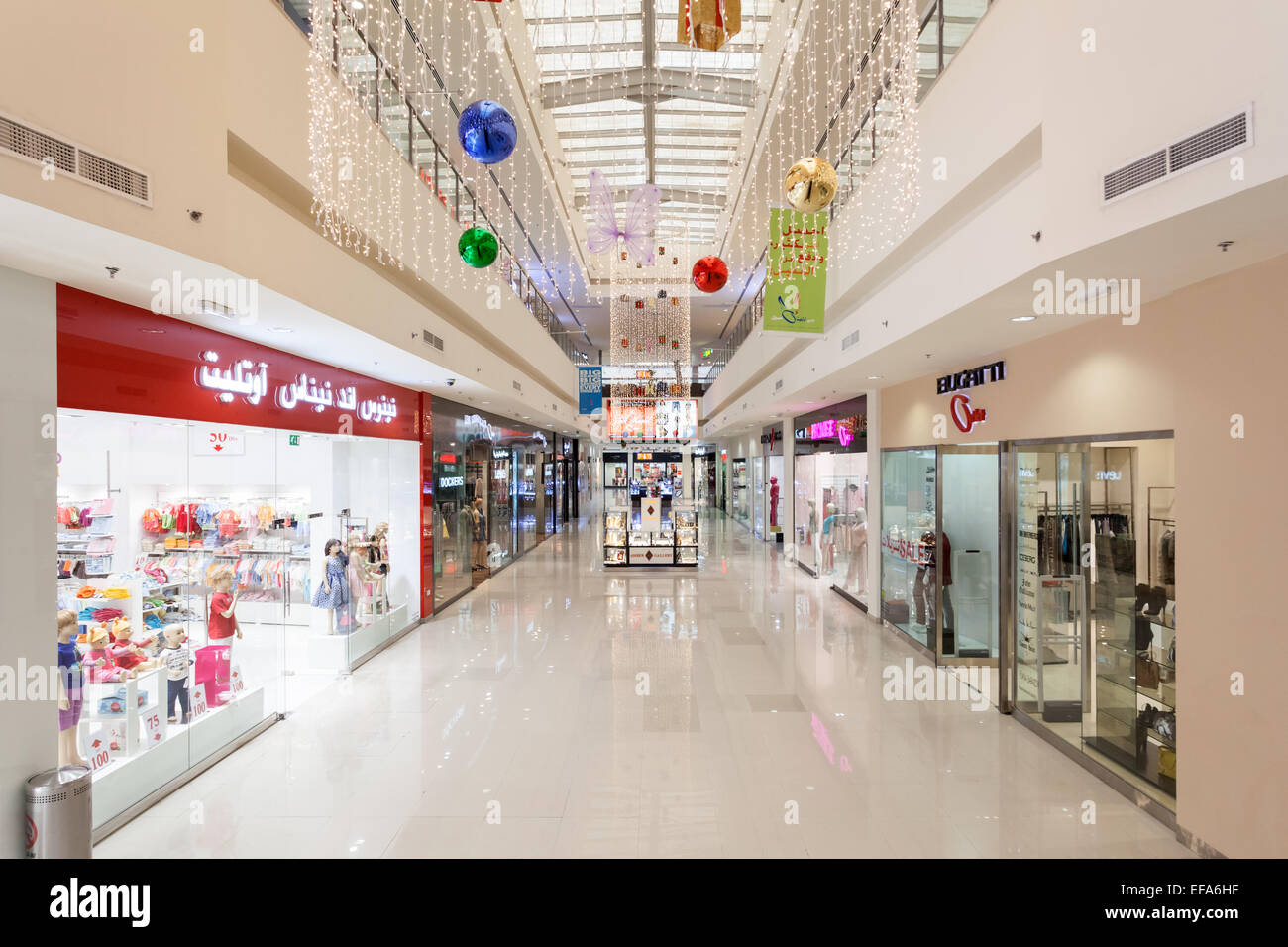 Interior of Dubai Outlet Mall. The shopping mall is part of Dubai Outlet City in Dubai Stock Photo