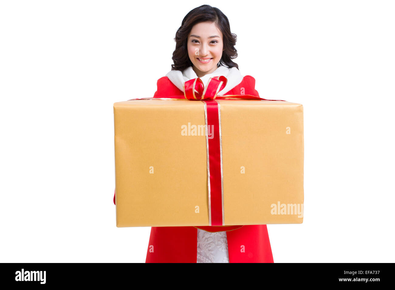 Happy young woman holding a large gift Stock Photo - Alamy