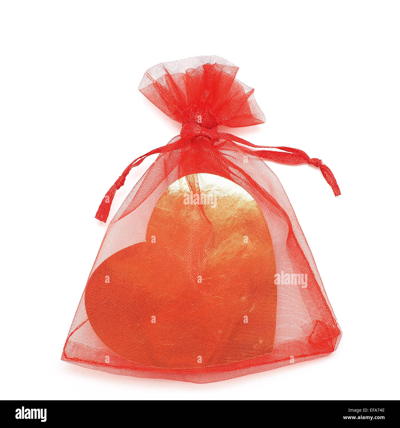 golden heart in red pouch for valentine gift Stock Photo