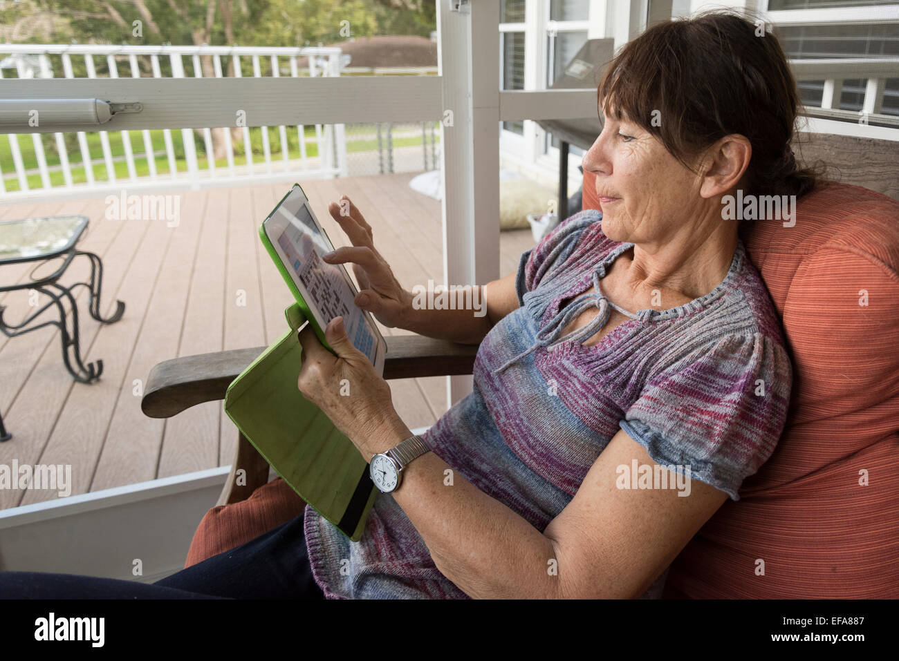 senior citizen using ipad Stock Photo