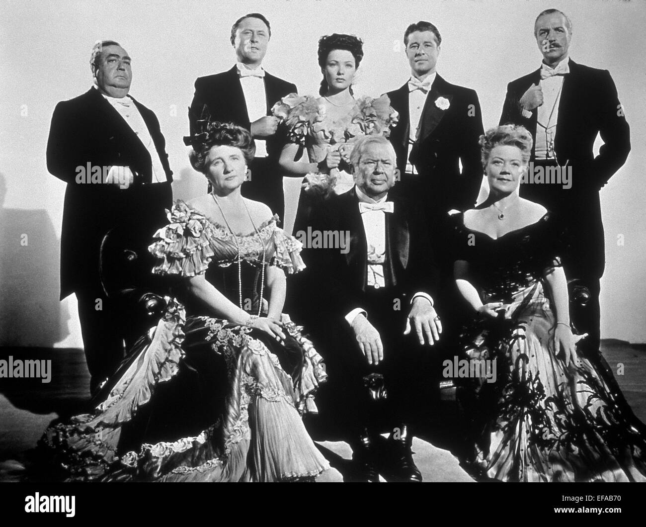 EUGENE PALLETTE, ALLYN JOSLYN, GENE TIERNEY, DON AMECHE, LOUIS CALHERN, MARJORIE MAIN, CHARLES COBURN, SPRING BYINGTON, HEAVEN CAN WAIT, 1943 Stock Photo