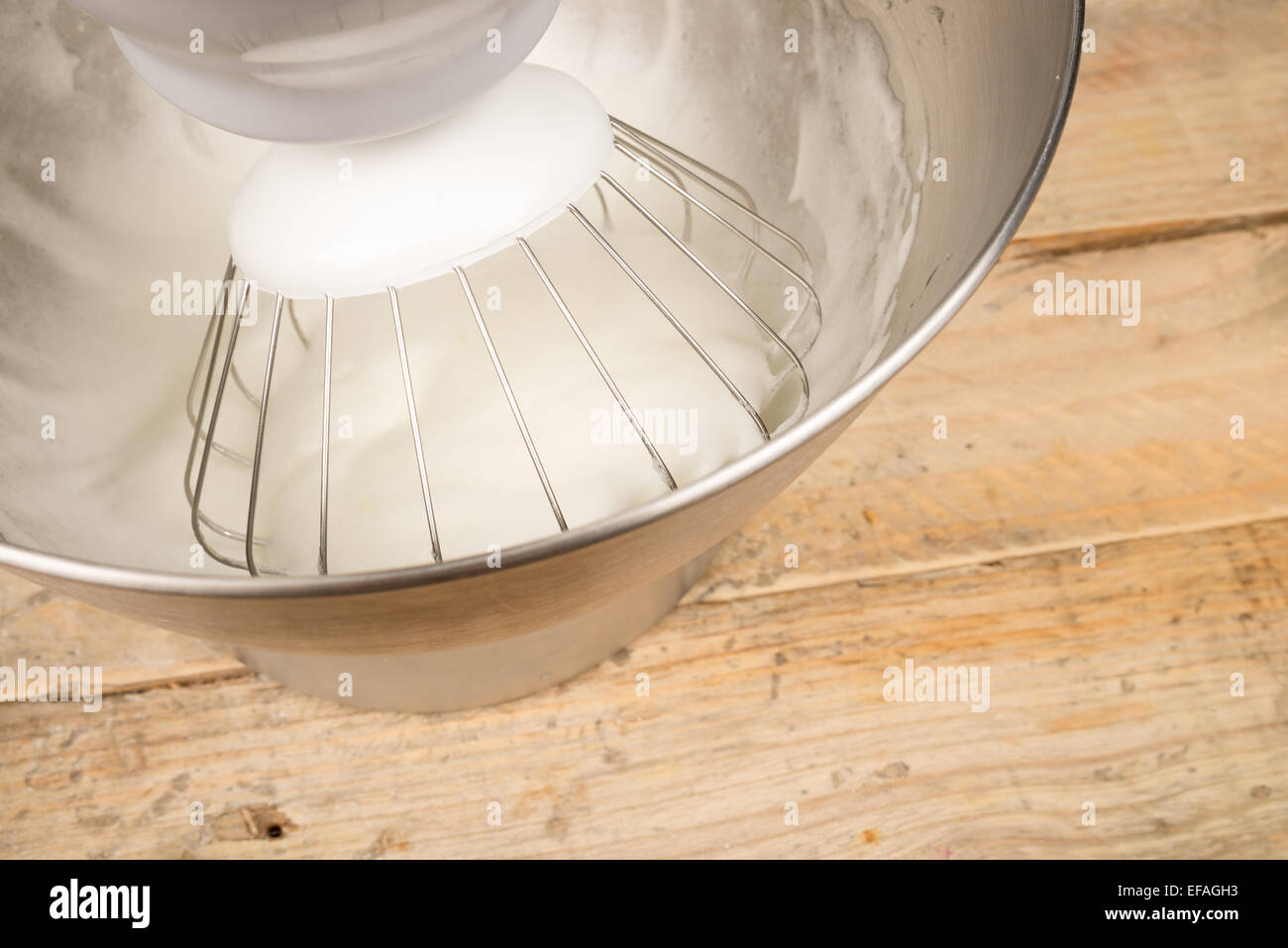 Egg whites being whisked inside a modern food processor Stock Photo Alamy