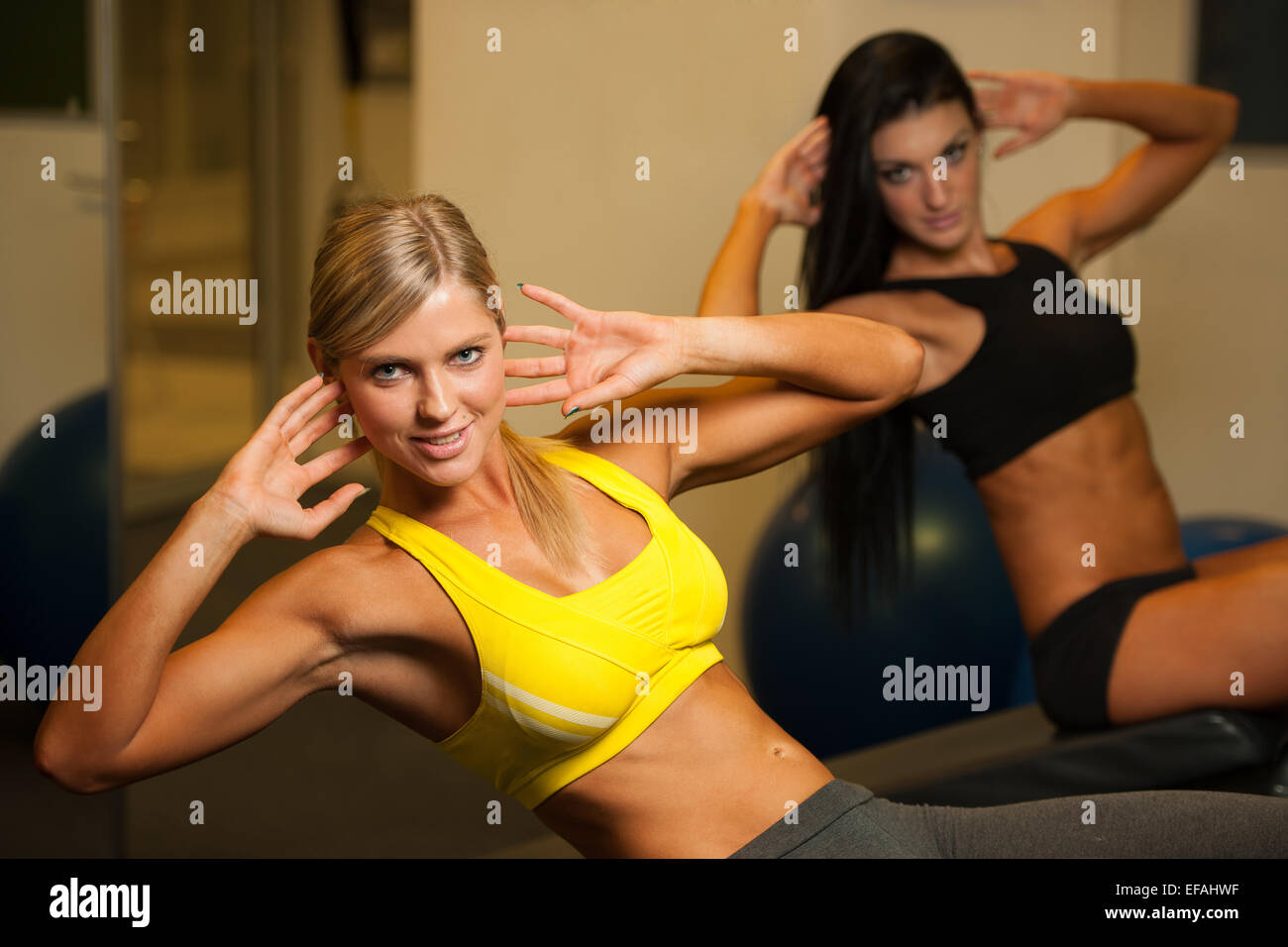 beautiful athletic woman working ab intervals Stock Photo