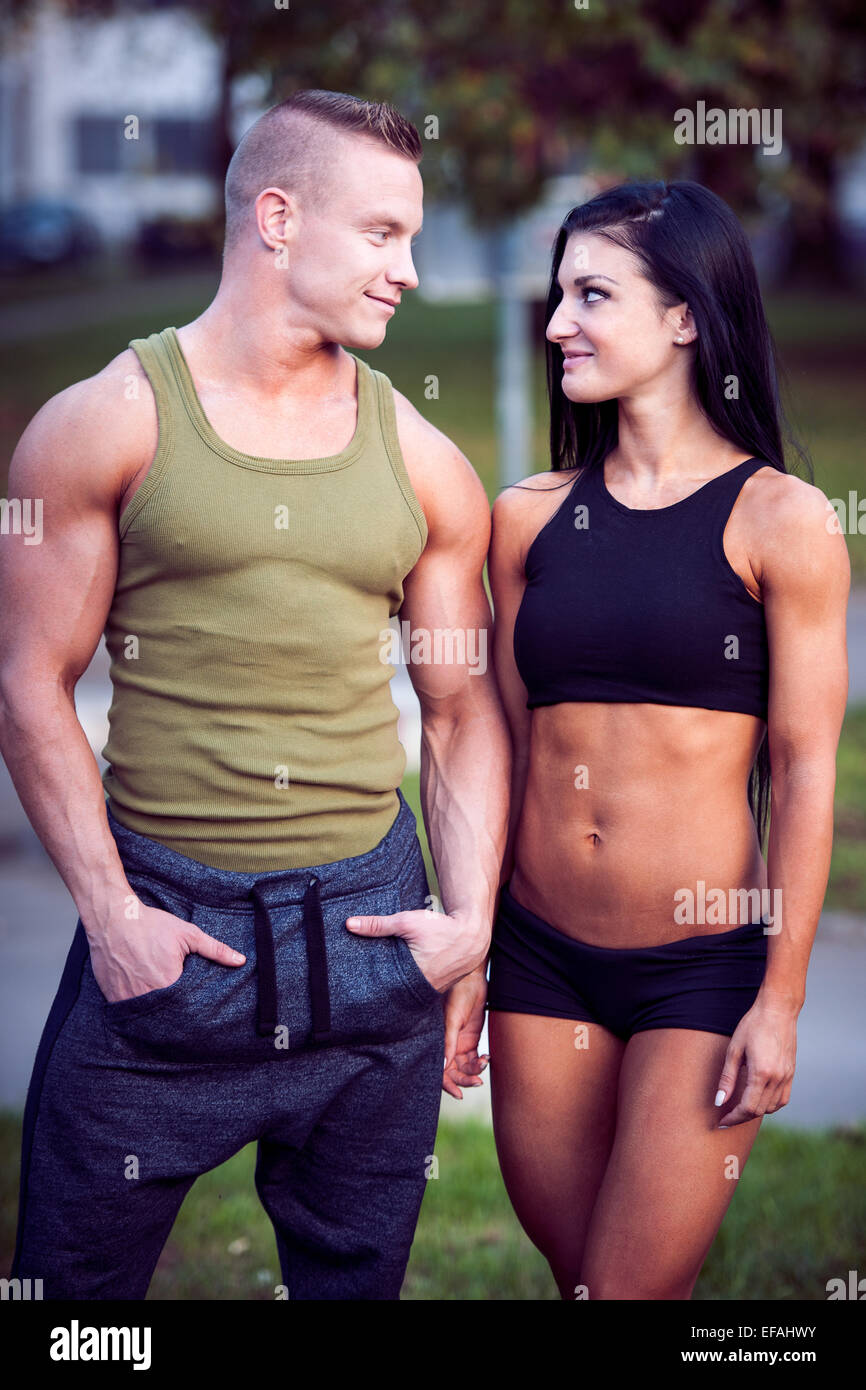 Fitness couple on a street workout outdoors Stock Photo