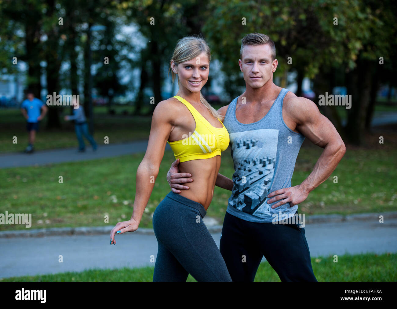Fitness couple on a street workout outdoors Stock Photo