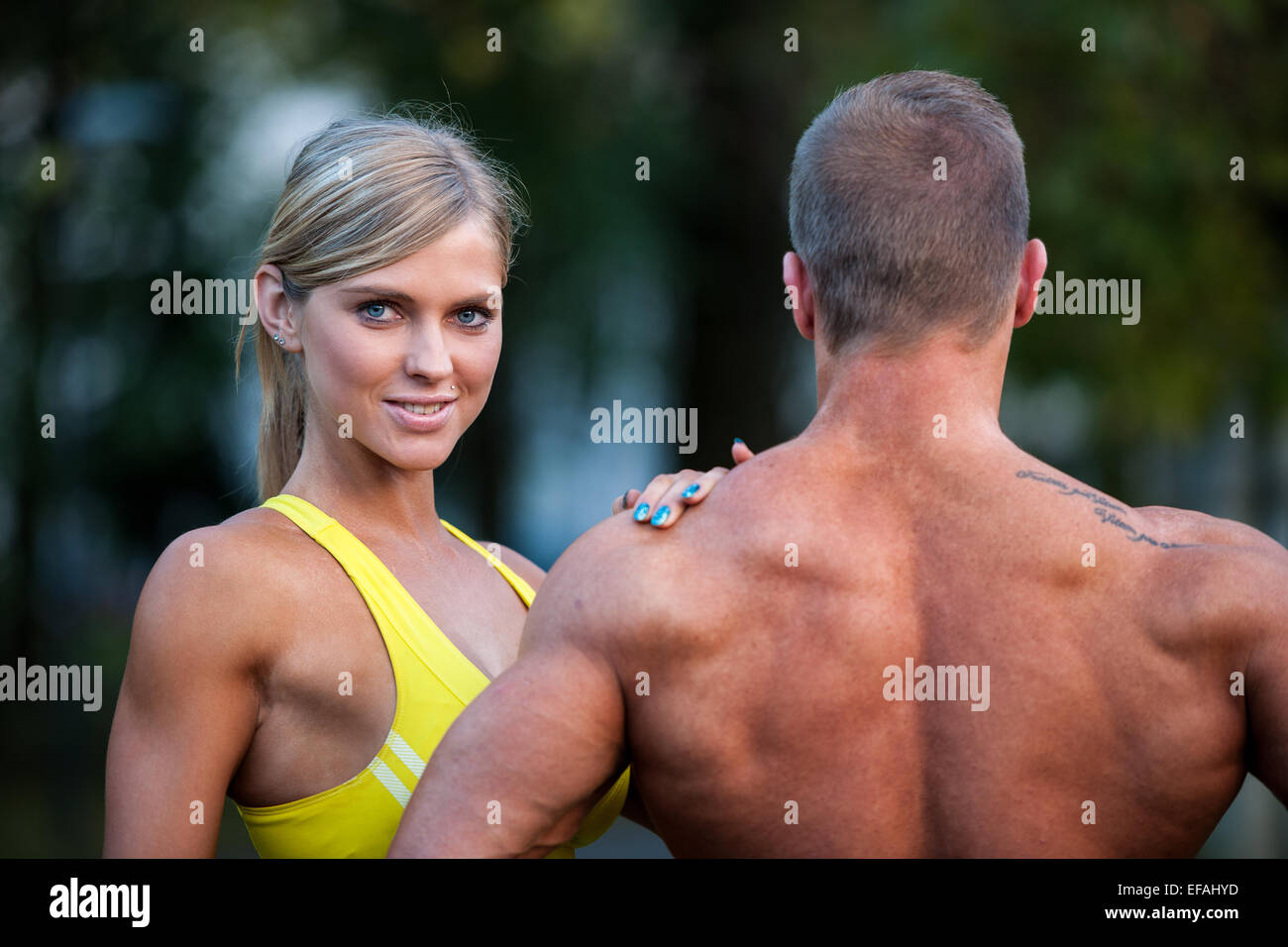 Fitness couple on a street workout outdoors Stock Photo