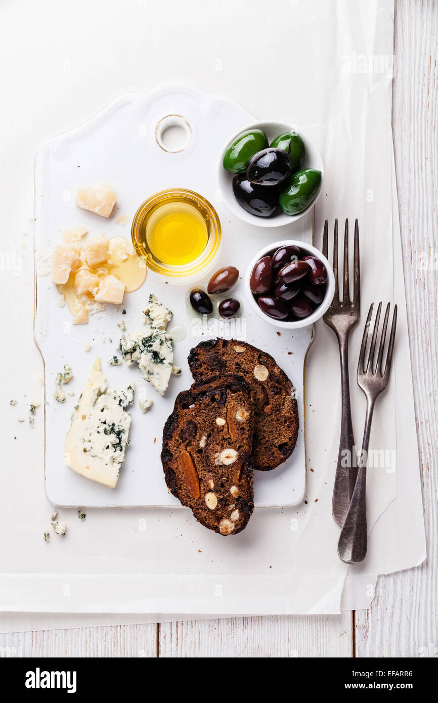 Cheese appetizer with honey and fruit bread Stock Photo