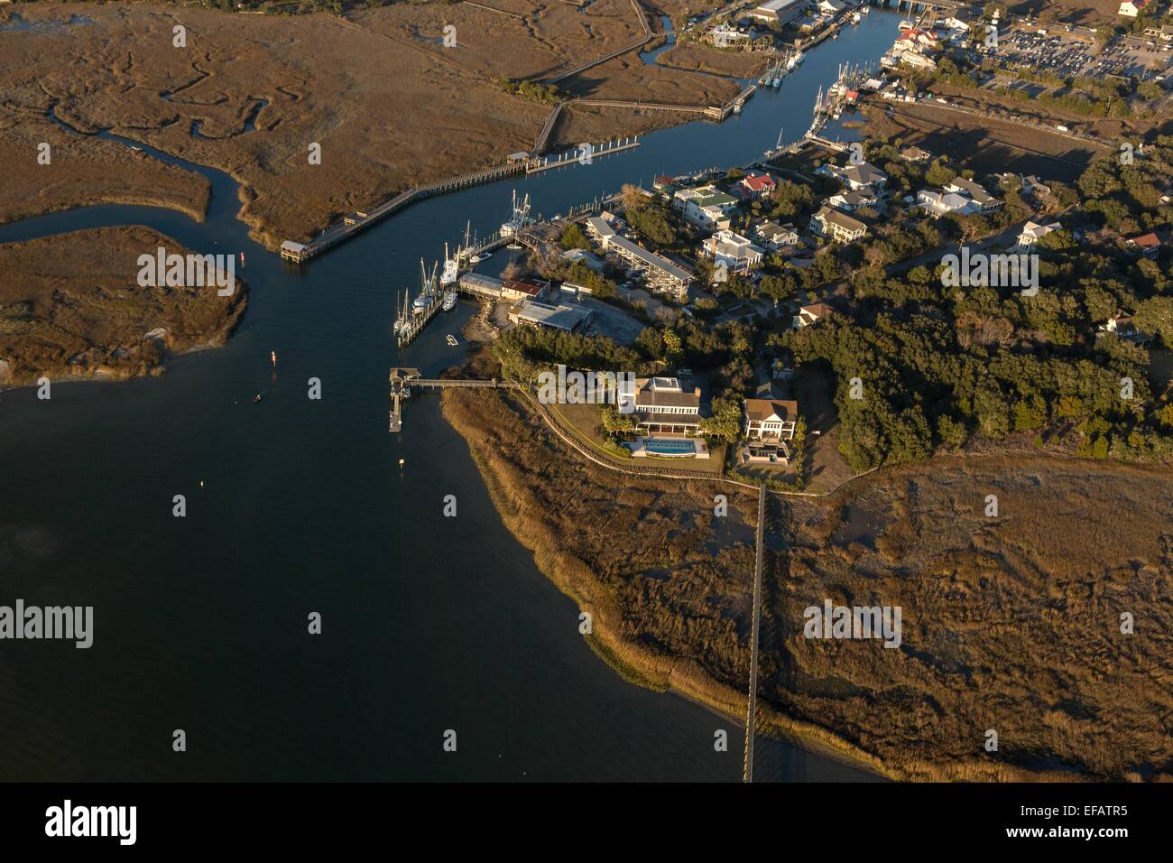 Aerial view of Shem Creek homes and shrimp boats in Mt Pleasant, SC