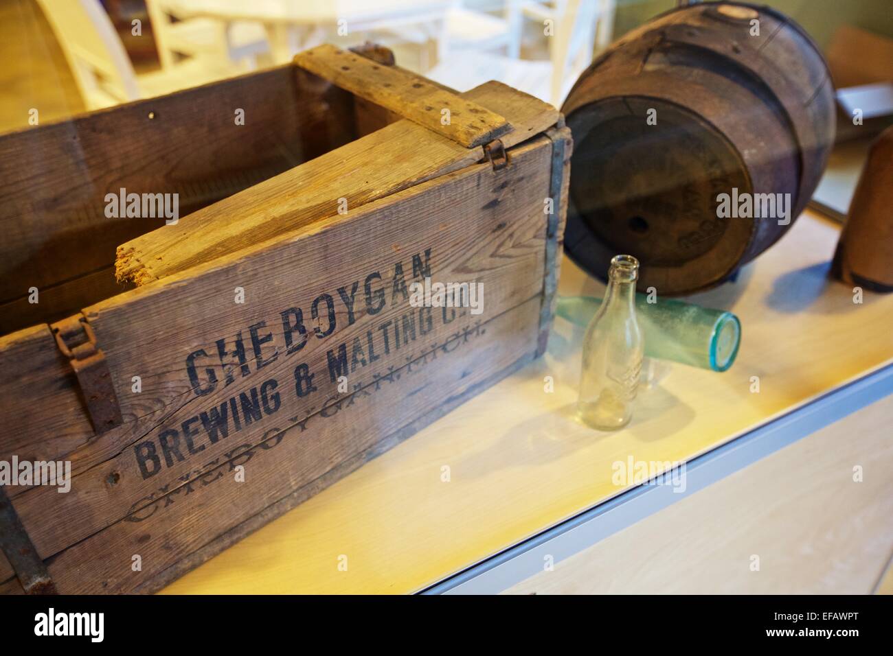 Display of an old wooden crate and barrel from Cheboygan Brewing and Malting Company Stock Photo