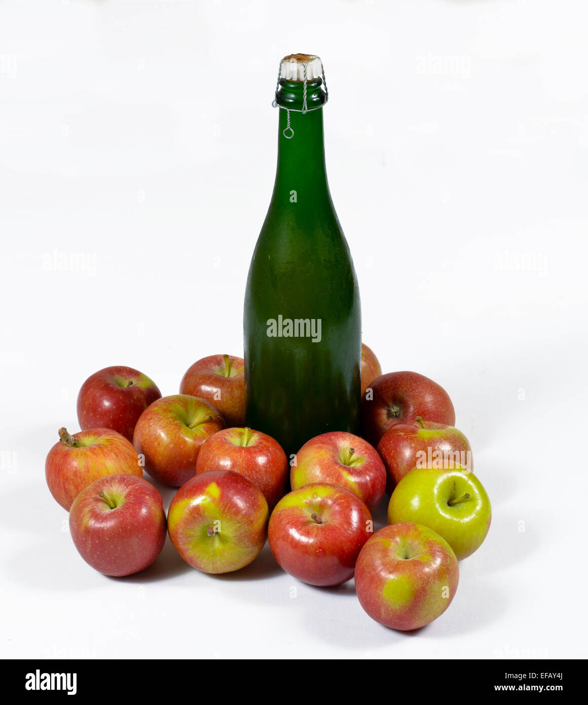 bottle of cider with apples on the white background Stock Photo