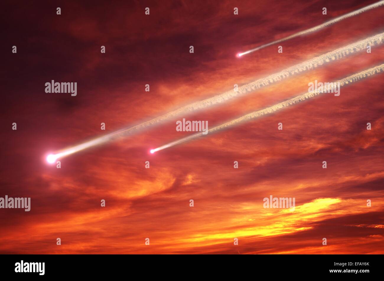 flying smoky meteors on background of sky Stock Photo