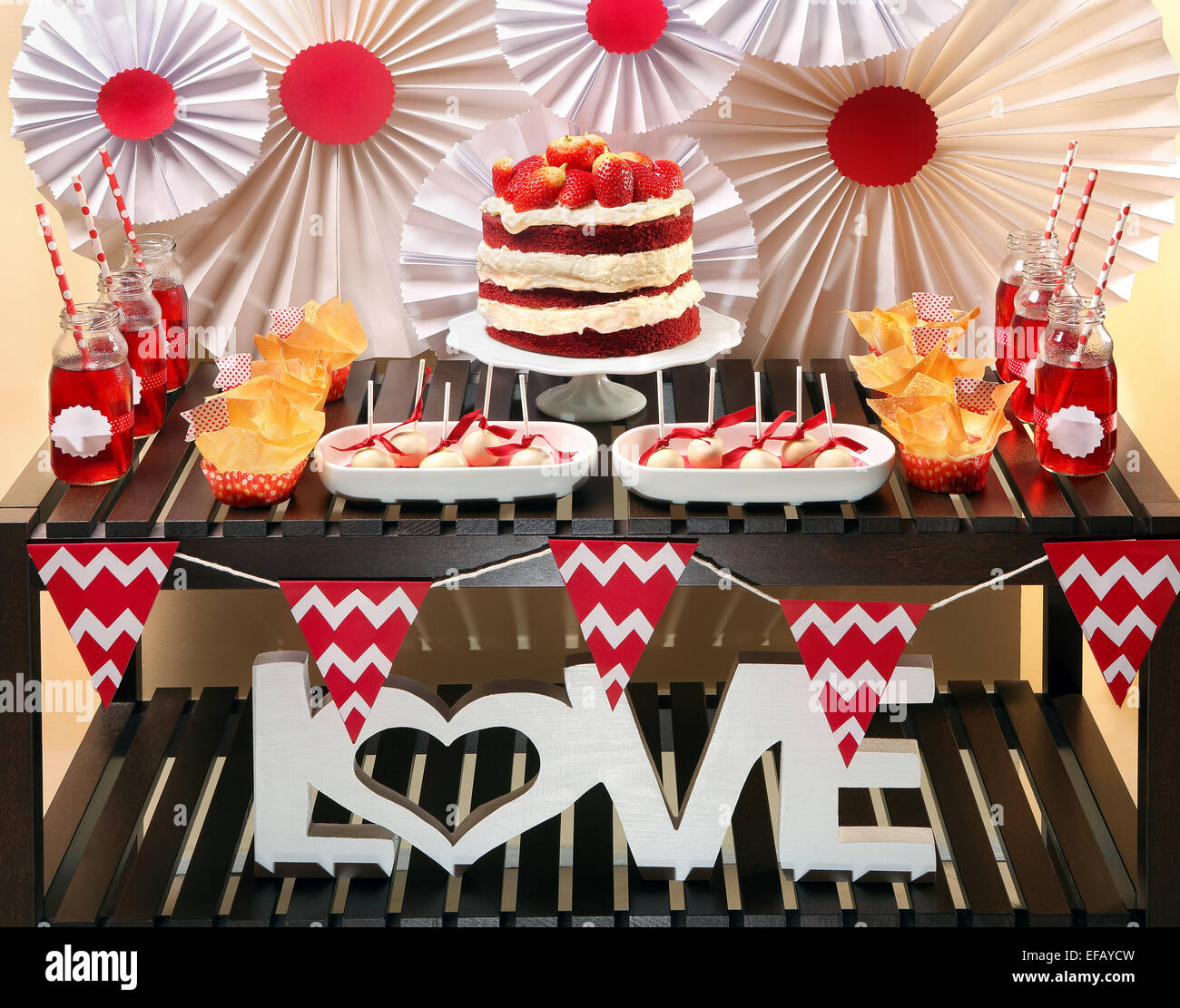 Valentine's Day party table with red velvet cake Stock Photo