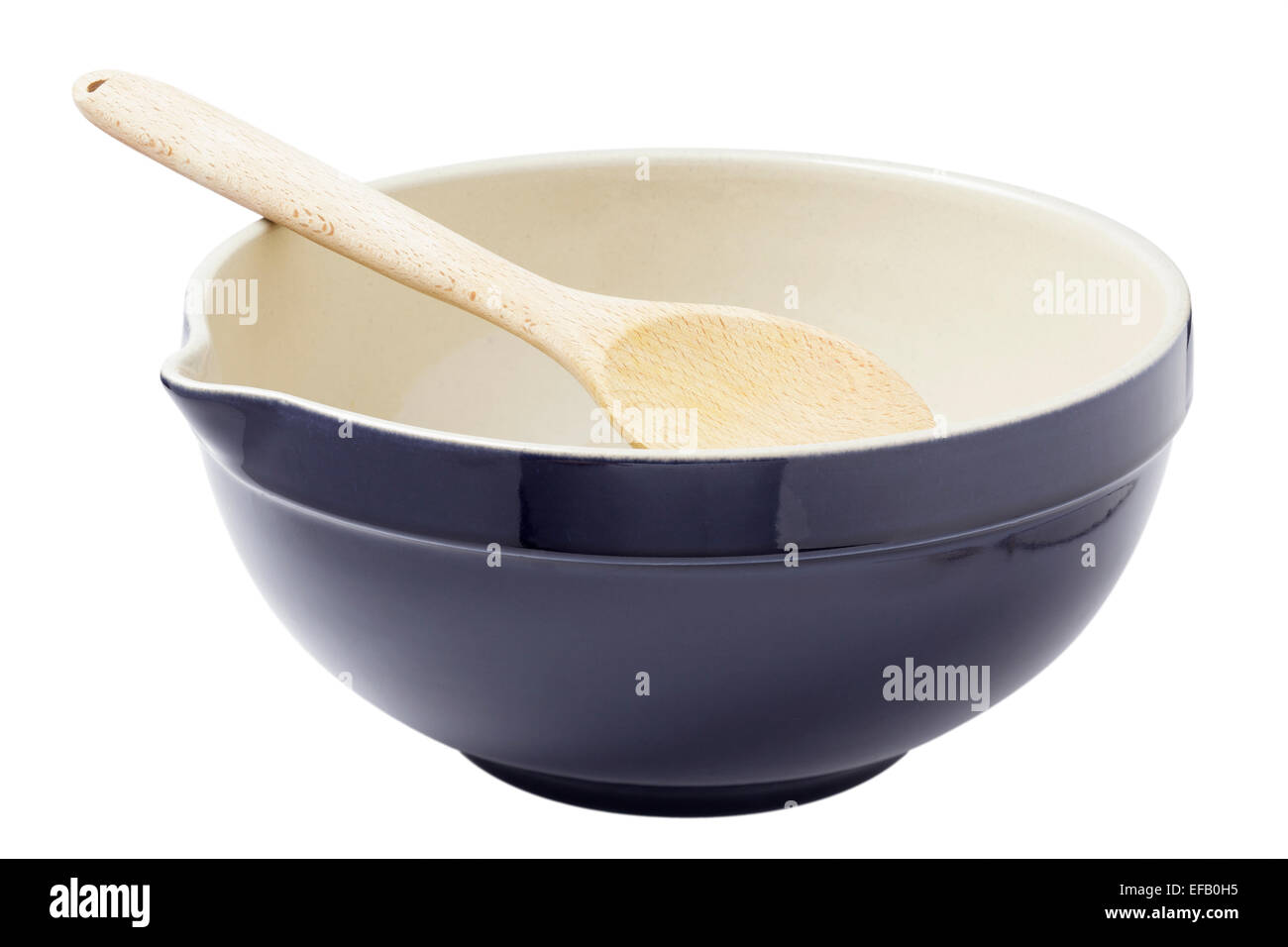 Mixing together ingredients of hot-water crust pastry dough, using wooden  spoon Stock Photo - Alamy