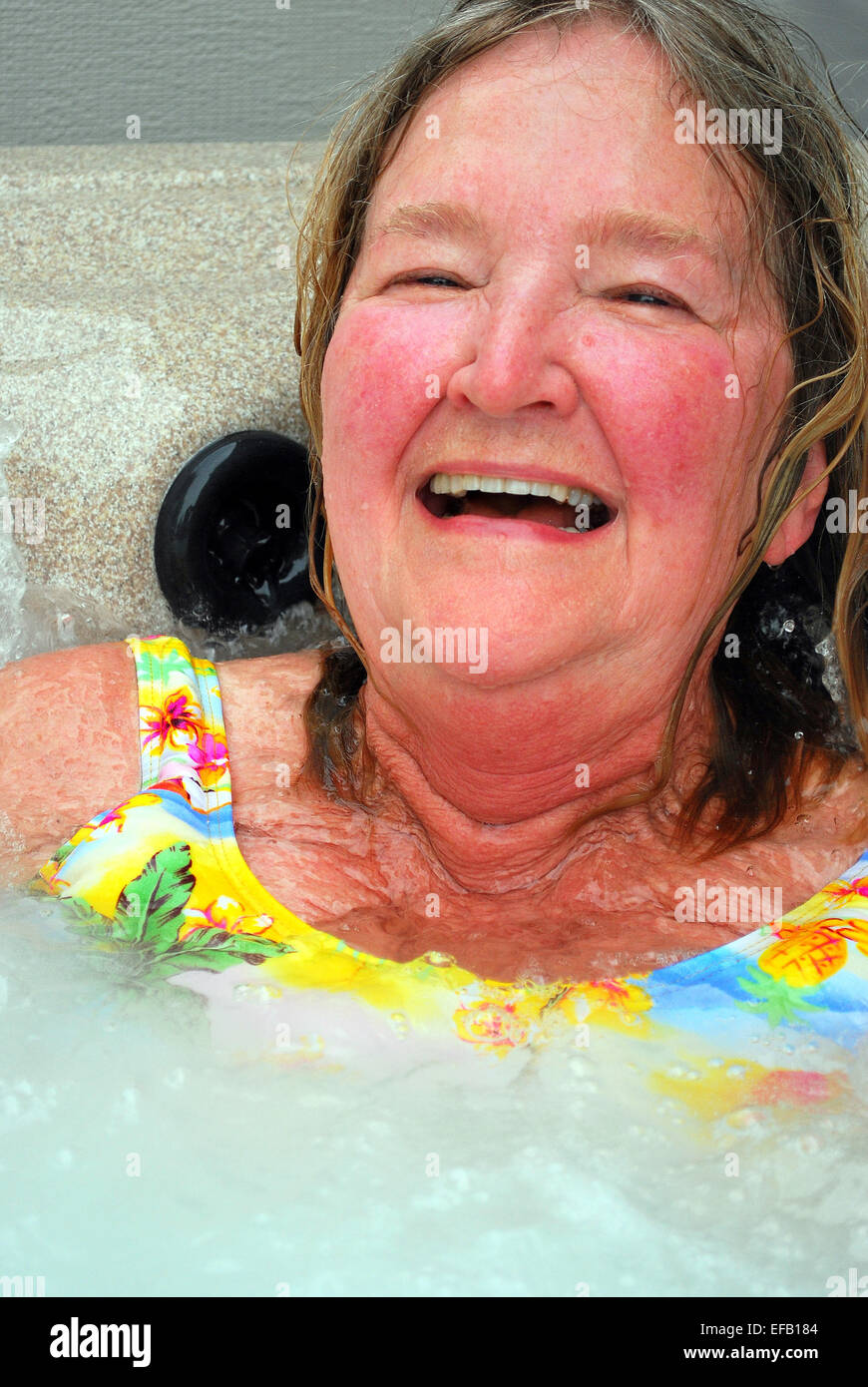 Female relaxing in hot tub at home Stock Photo Alamy
