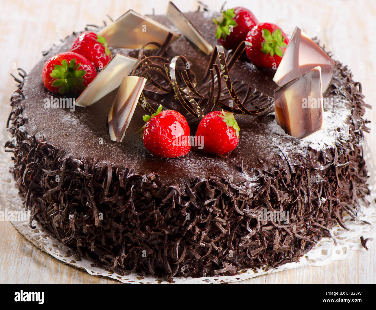 Sweet chocolate cake with strawberries. Selective focus Stock Photo - Alamy
