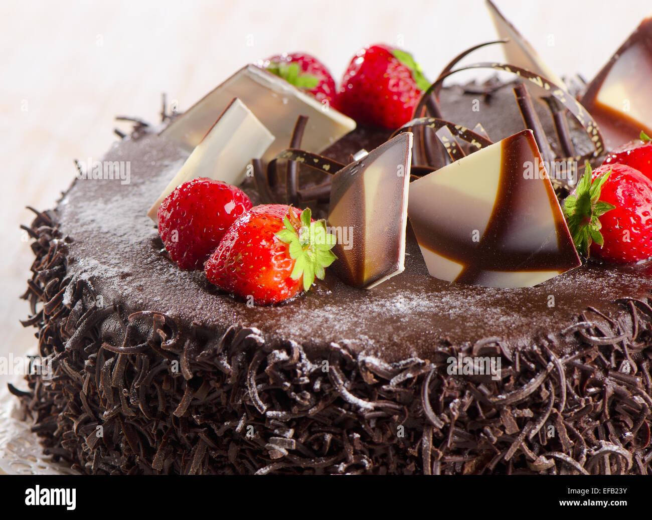 Sweet chocolate cake with strawberries. Selective focus Stock Photo - Alamy