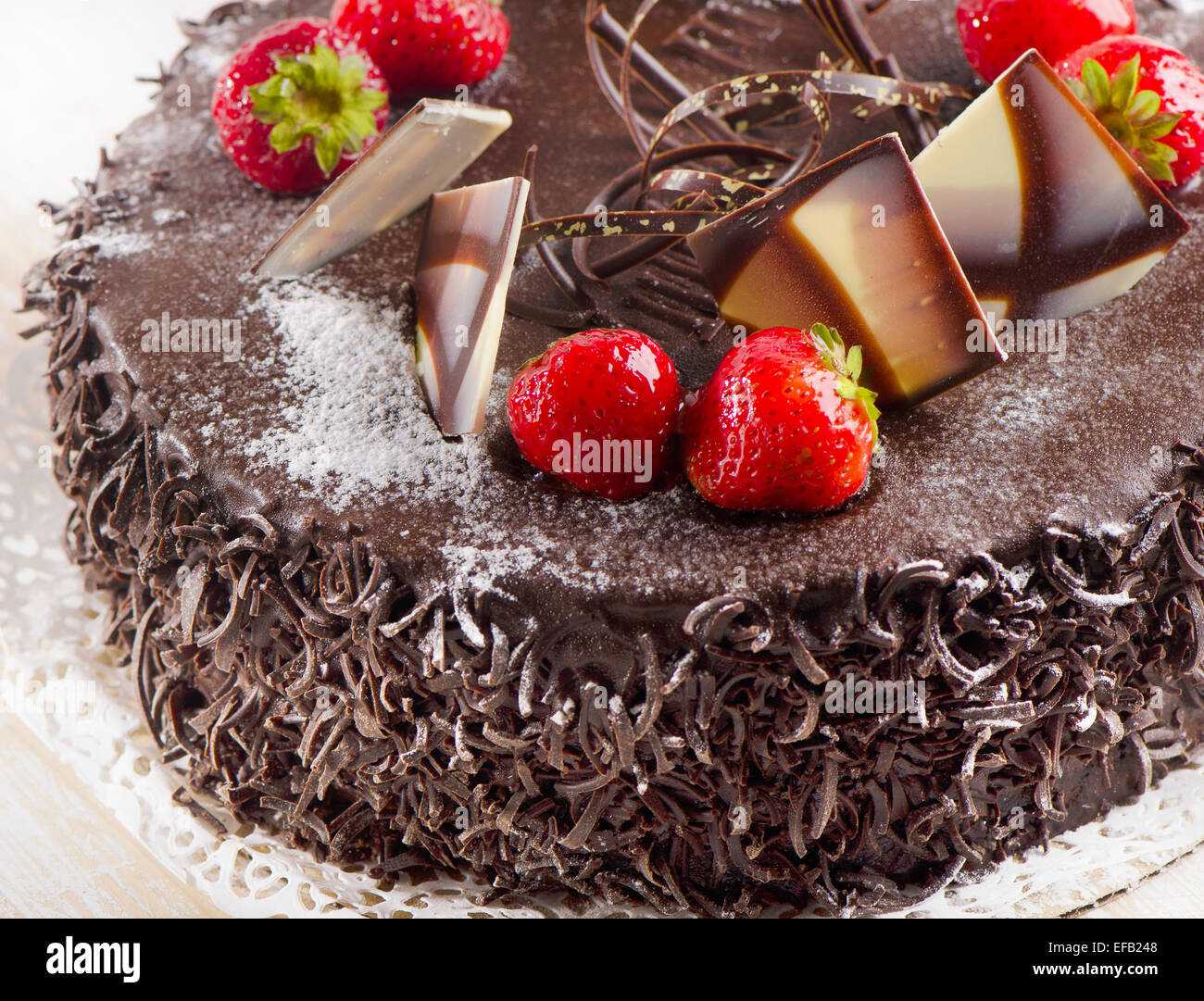 Sweet chocolate cake with strawberries. Selective focus Stock Photo - Alamy