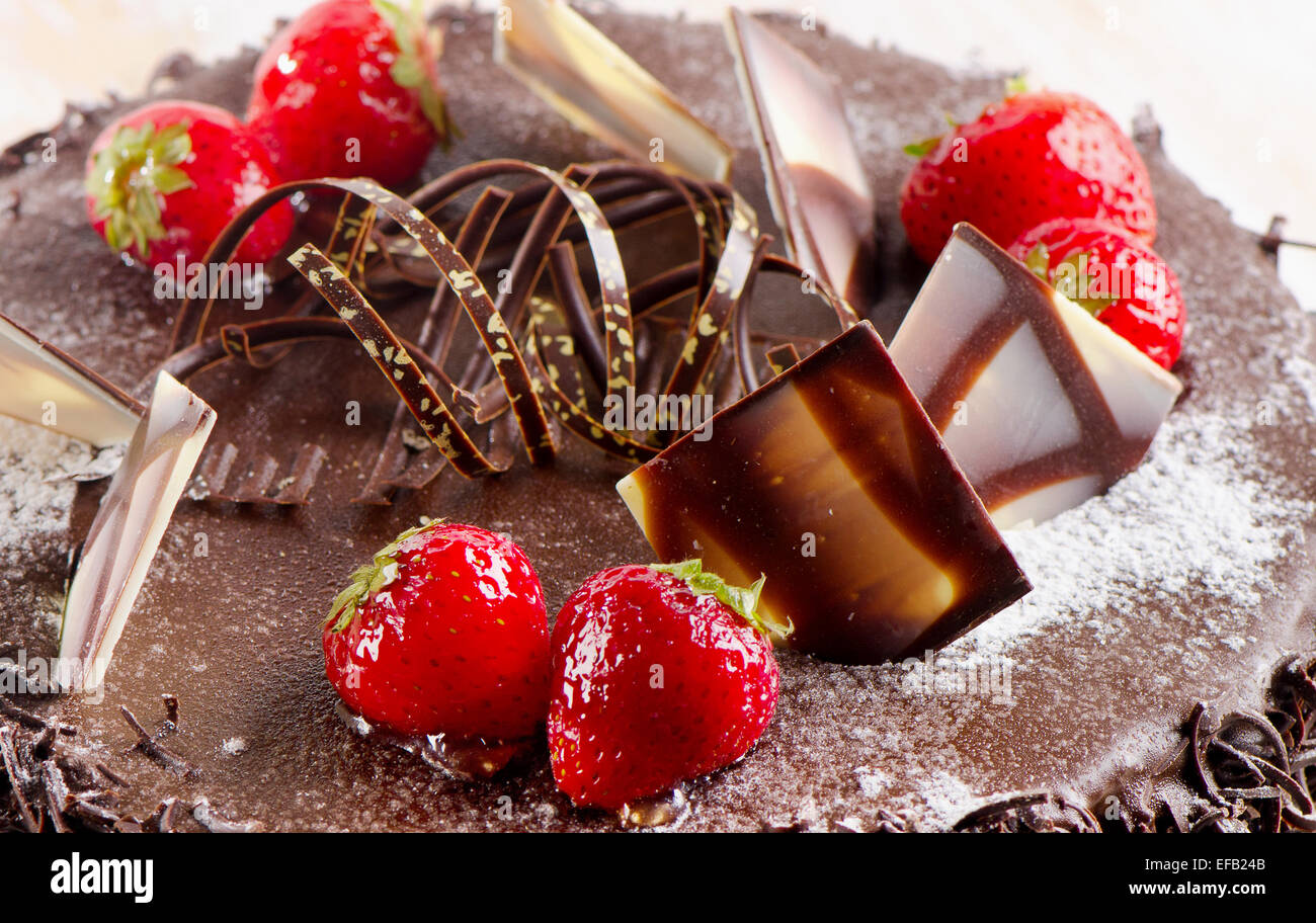 Sweet chocolate cake with strawberries. Selective focus Stock Photo - Alamy
