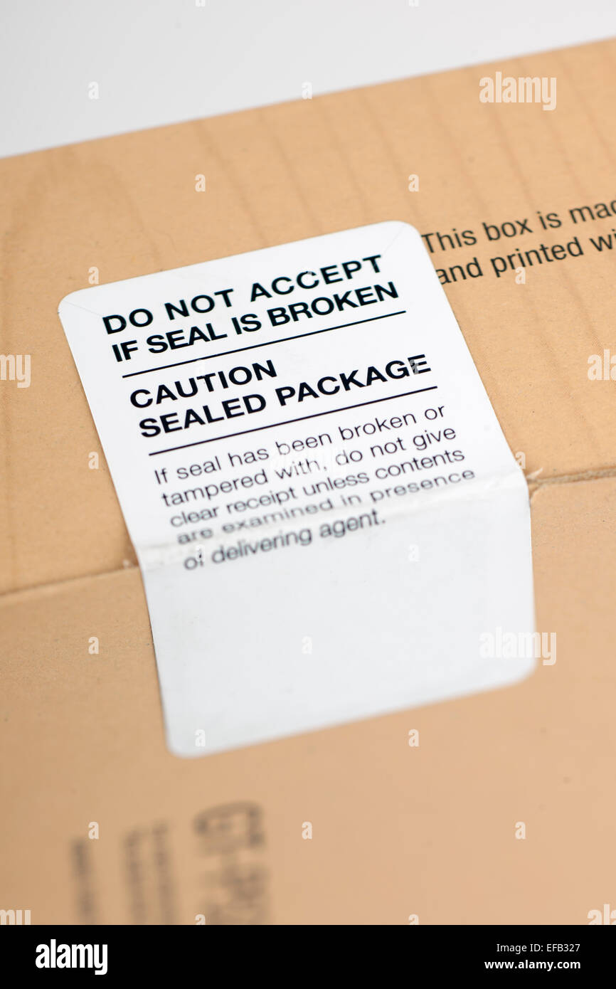 Do not accept if seal is broken label and caution sealed package Stock Photo