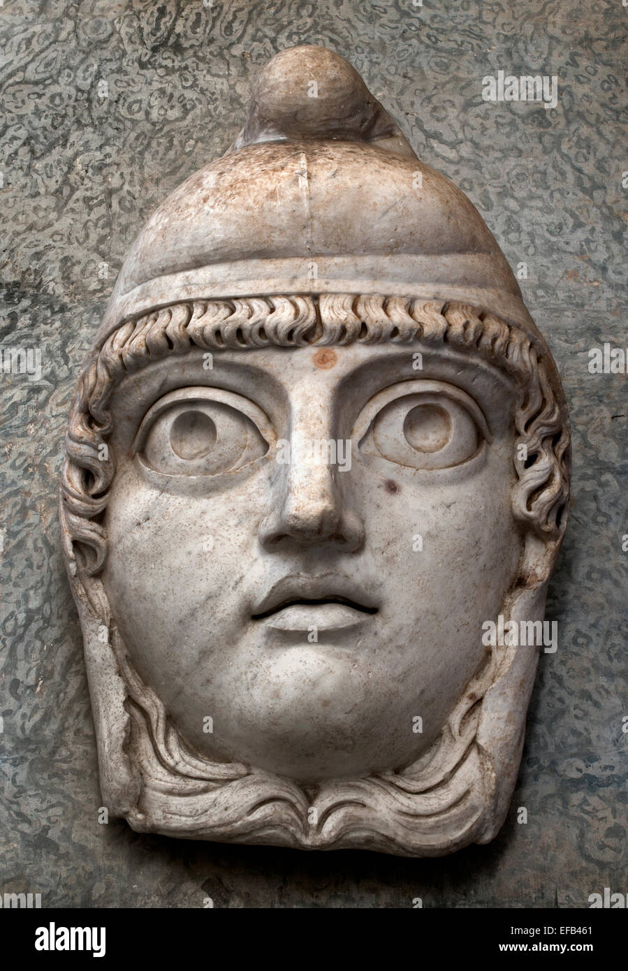 Antiquity marble mask of a Satyr - Cortile Ottagonale of the Museo Pio-Clementino  ( Vatican Museum Rome Italy ) Stock Photo