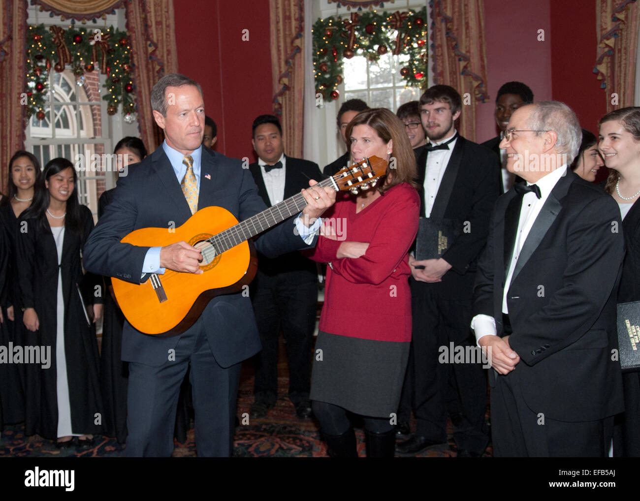Governor of Maryland Martin O'Malley plays the guitar during an open house at the Governors Residence December 13, 2014 in Annapolis, Maryland. Stock Photo