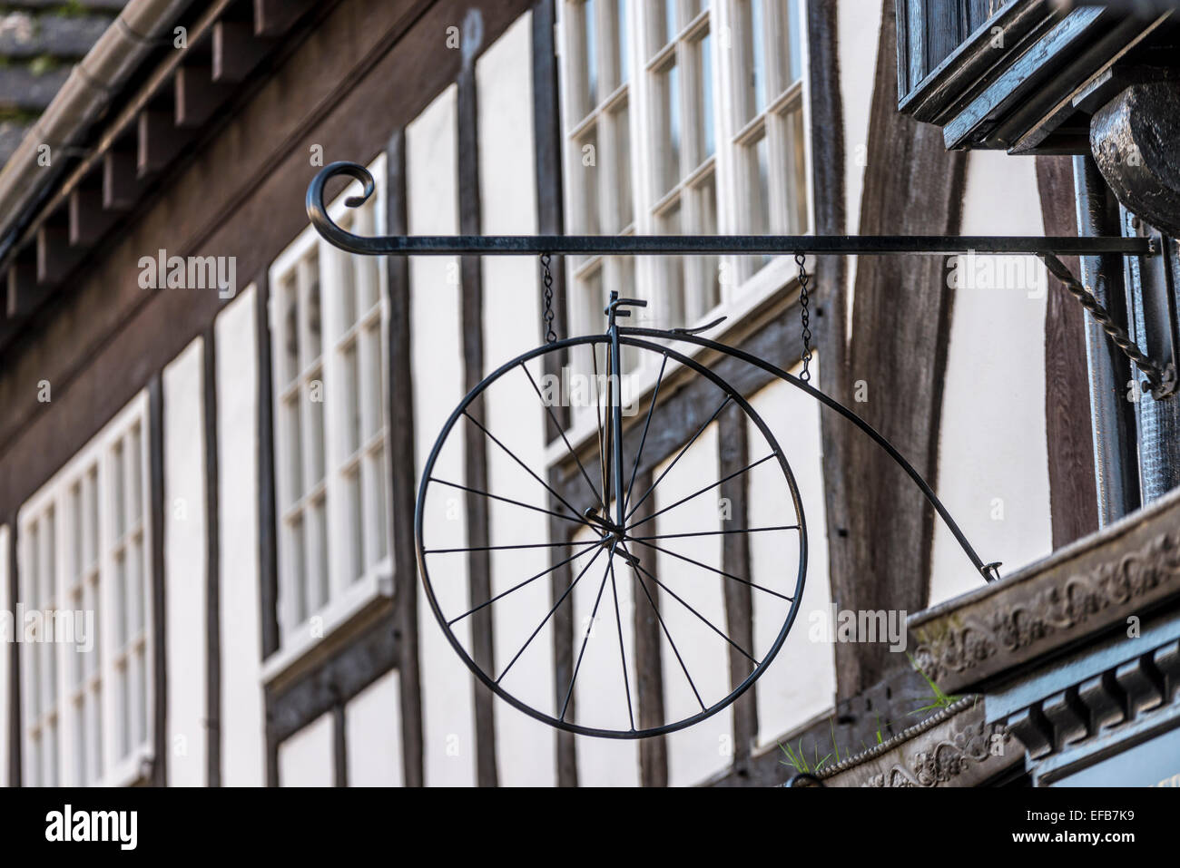 Penny farthing shop sign. East Grinstead. West Sussex, England. UK Stock Photo