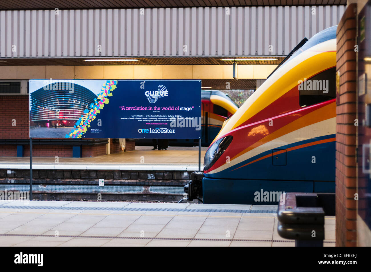 Two East Midlands Trains express passenger trains passing at Leicester train station Stock Photo