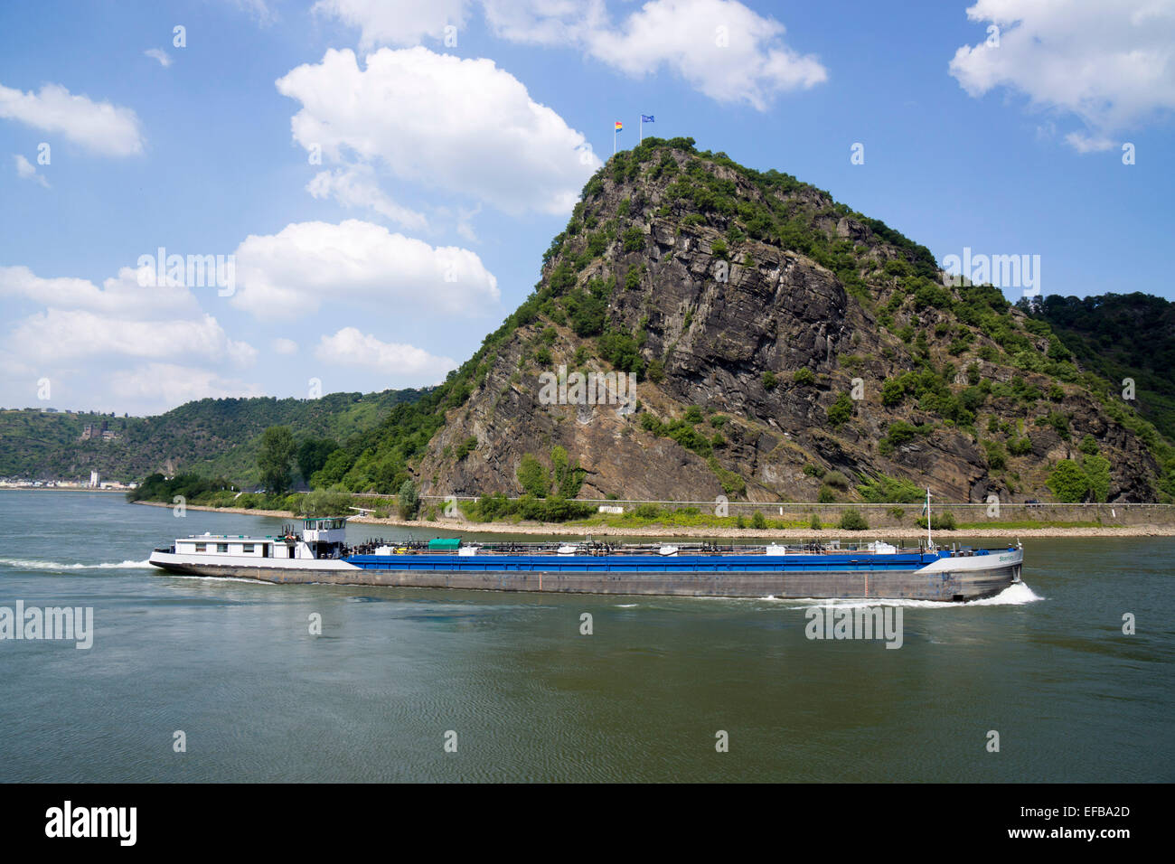 Cargo ship on the Rhine at the Lorelei rock, shale rock in the UNESCO World Heritage Upper Middle Rhine Valley near St. Goar, St. Goar, Germany, Europe - 2014 Stock Photo