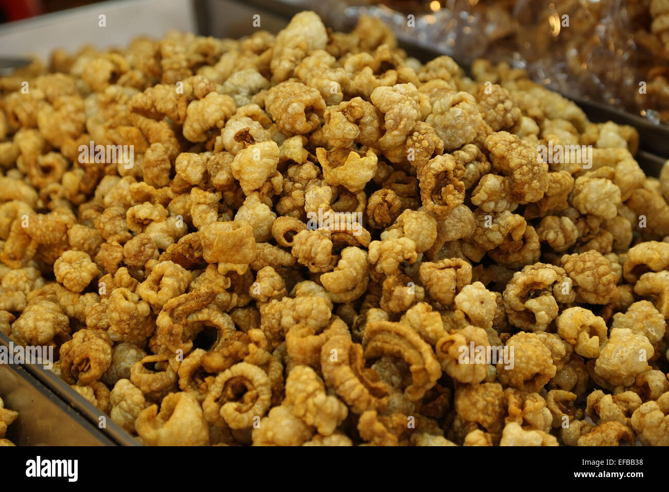 pork snack, pork rind, pork scratching or pork crackling (Thai style