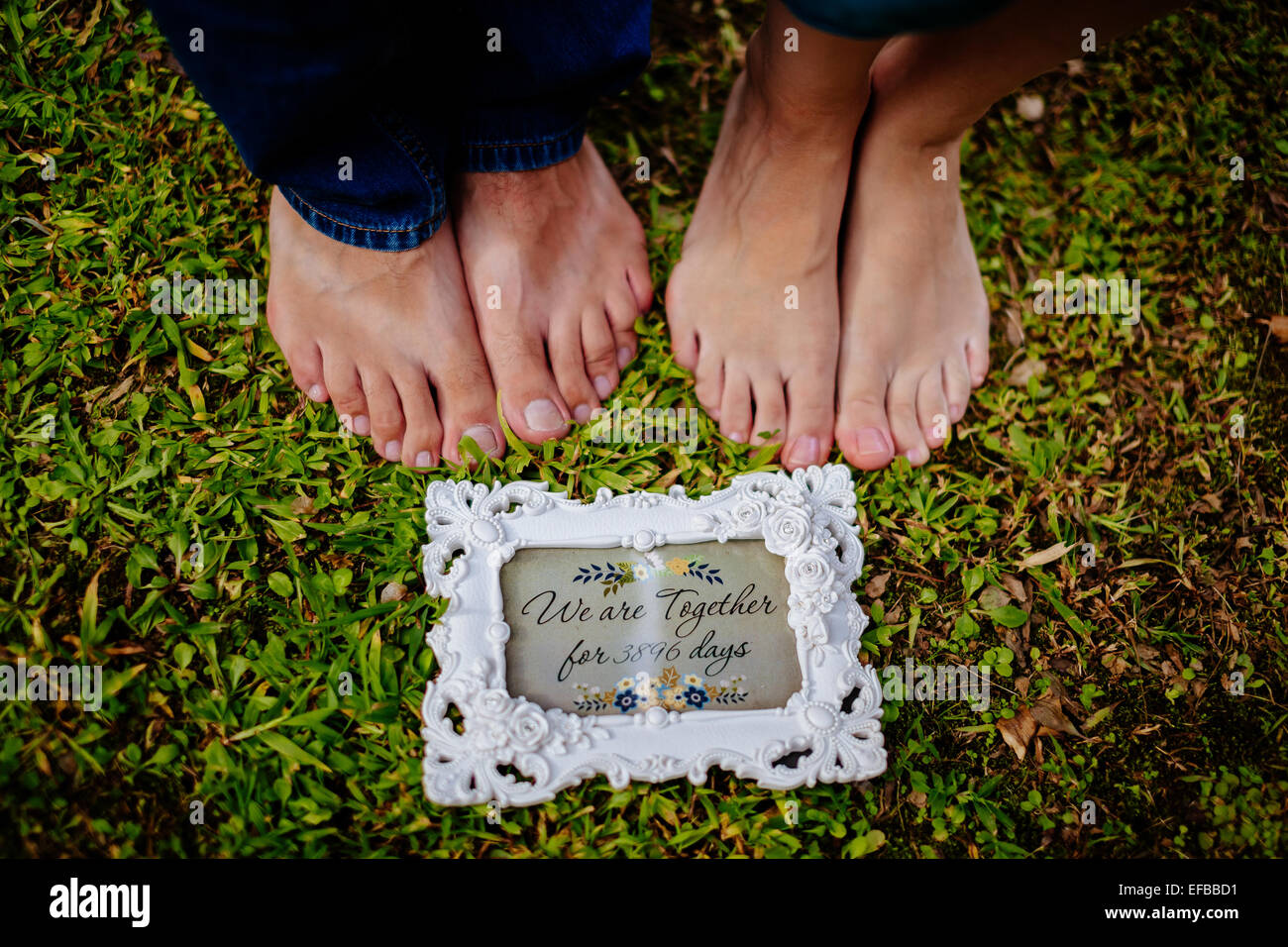 Closeup male female feet on hires stock photography and images Alamy