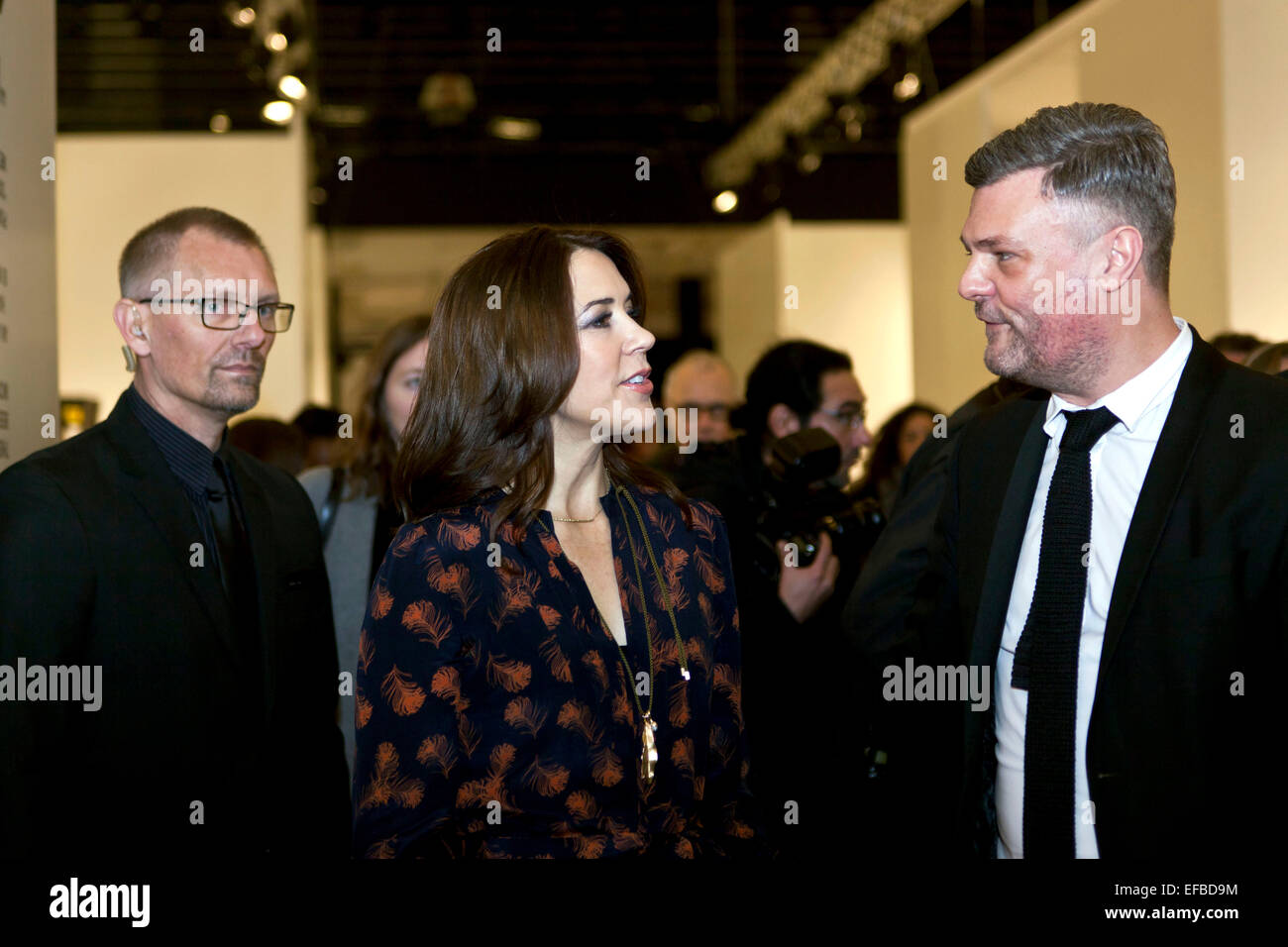 Copenhagen, Denmark. 30th January, 2015. HRH Danish Crown Princess Mary (photo, mid) discus this week’s fashion fairs with Kristian W. Andersen (photo, right), Director for Copenhagen International Fashion Fair (CIFF) during her visit to the CIFF venue in FORUM this Friday in Copenhagen.. Credit:  OJPHOTOS/Alamy Live News Stock Photo