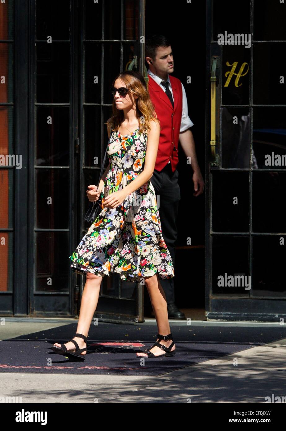 Alexa Chung seen wearing a floral knee length dress in the East Village  Featuring: Alexa Chung Where: New York City, New York, United States When: 28 Jul 2014 Stock Photo