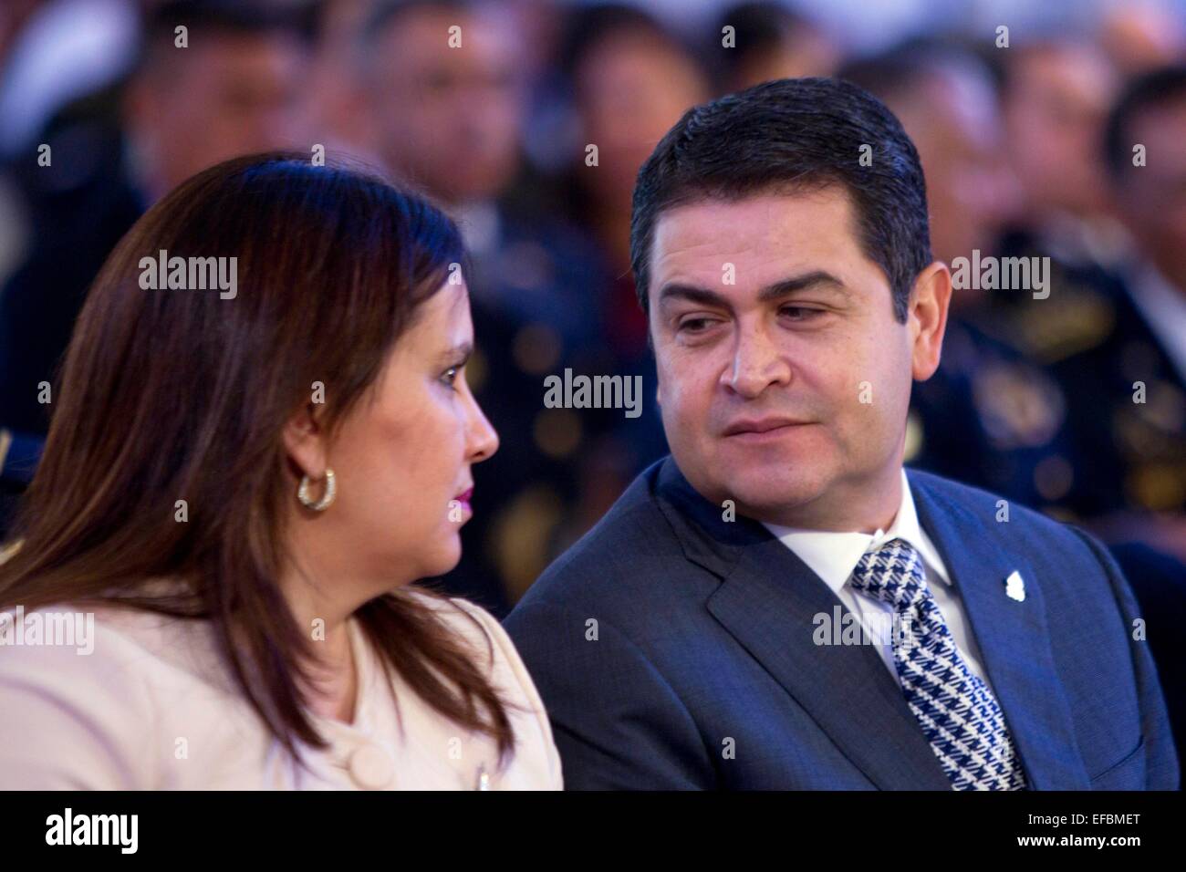 Tegucigalpa, Honduras. 30th Jan, 2015. Honduras' President Juan Orlando Hernandez (R) and his wife Ana Garcia de Hernandez (L) attend a religious service commemorating the 268th anniversary of the discovery of the Virgin of Suyapa, which is a six-centimeter tall 18th-century statue of the Virgin Mary, in the Suyapa Basilica, in Tegucigalpa, Honduras, on Jan. 30, 2015. Credit:  Rafael Ochoa/Xinhua/Alamy Live News Stock Photo