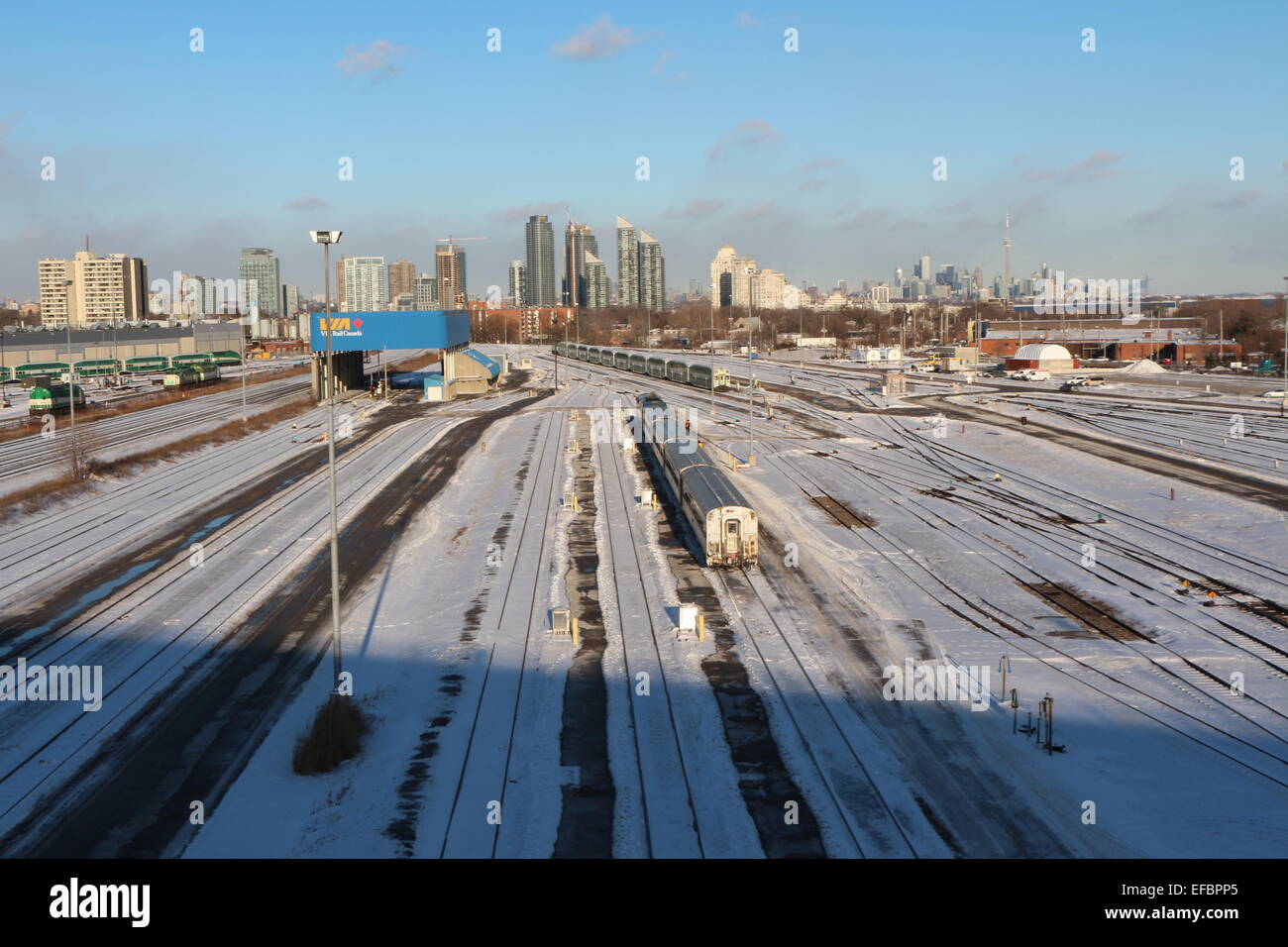 a Toronto,Canada train yard photo,also showing the skyscrapers of Toronto ,blue sky Stock Photo